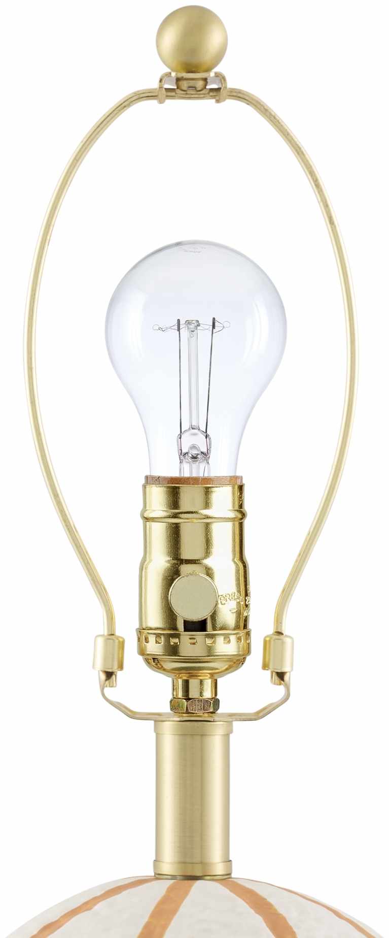 Vintage-style lamp with clear bulb and gold fixture on a white background