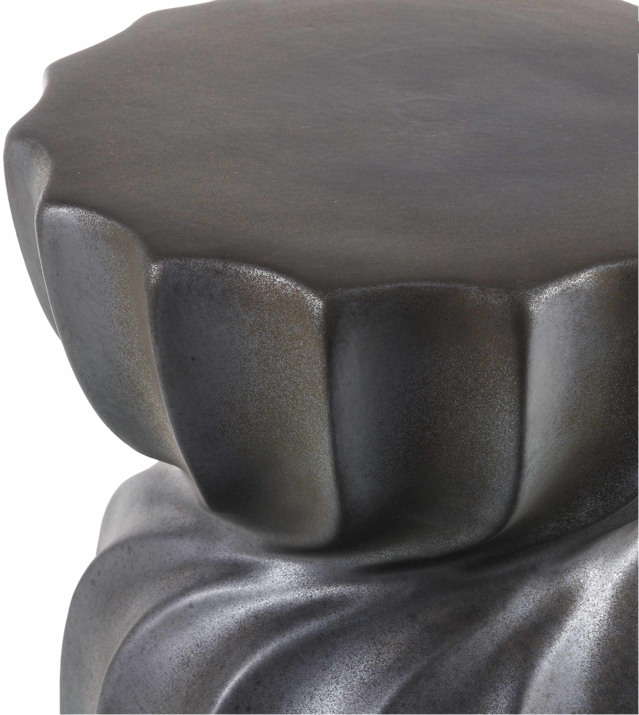 Close-up of a textured black surface with a white background