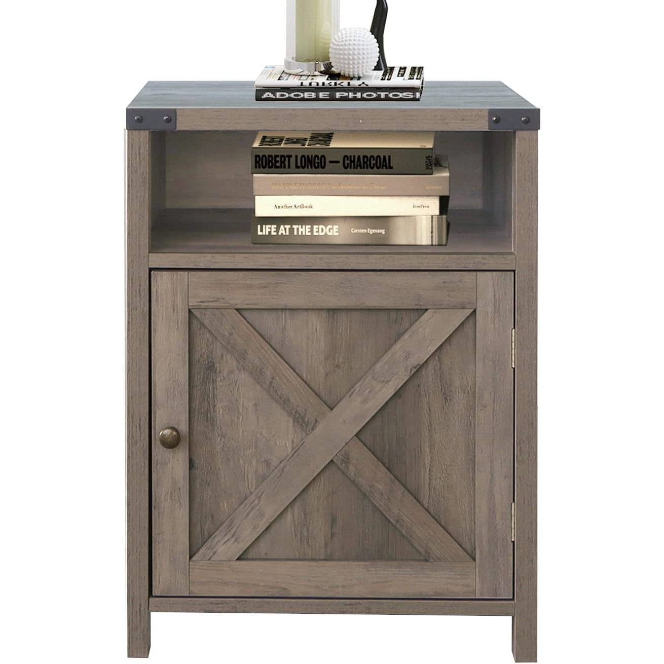 Wooden side table with a cabinet and books on top against a white background