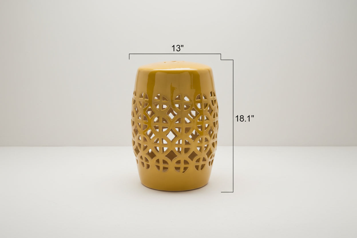 Yellow ceramic stool with geometric pattern and dimensions on a white background