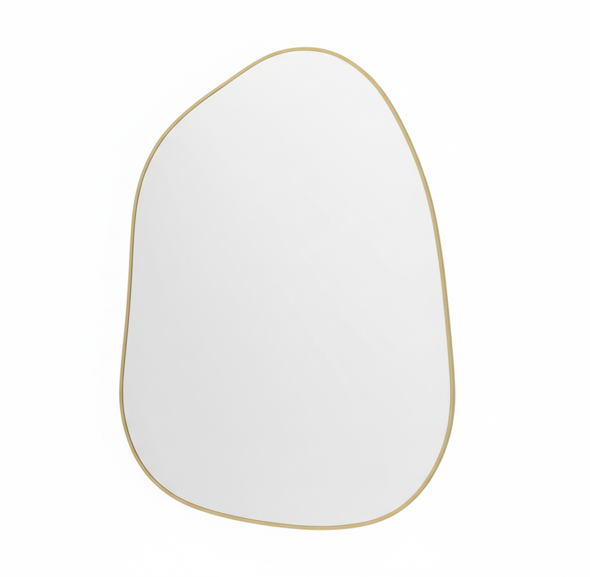 Round mirror on a wall with a framed artwork and decorative items below.