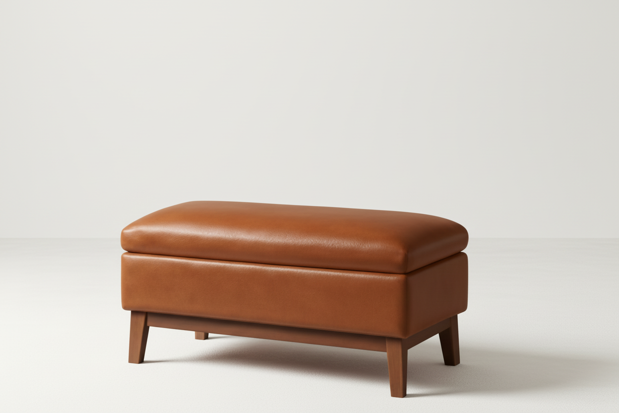 Brown leather ottoman in a room with framed abstract art on the wall.