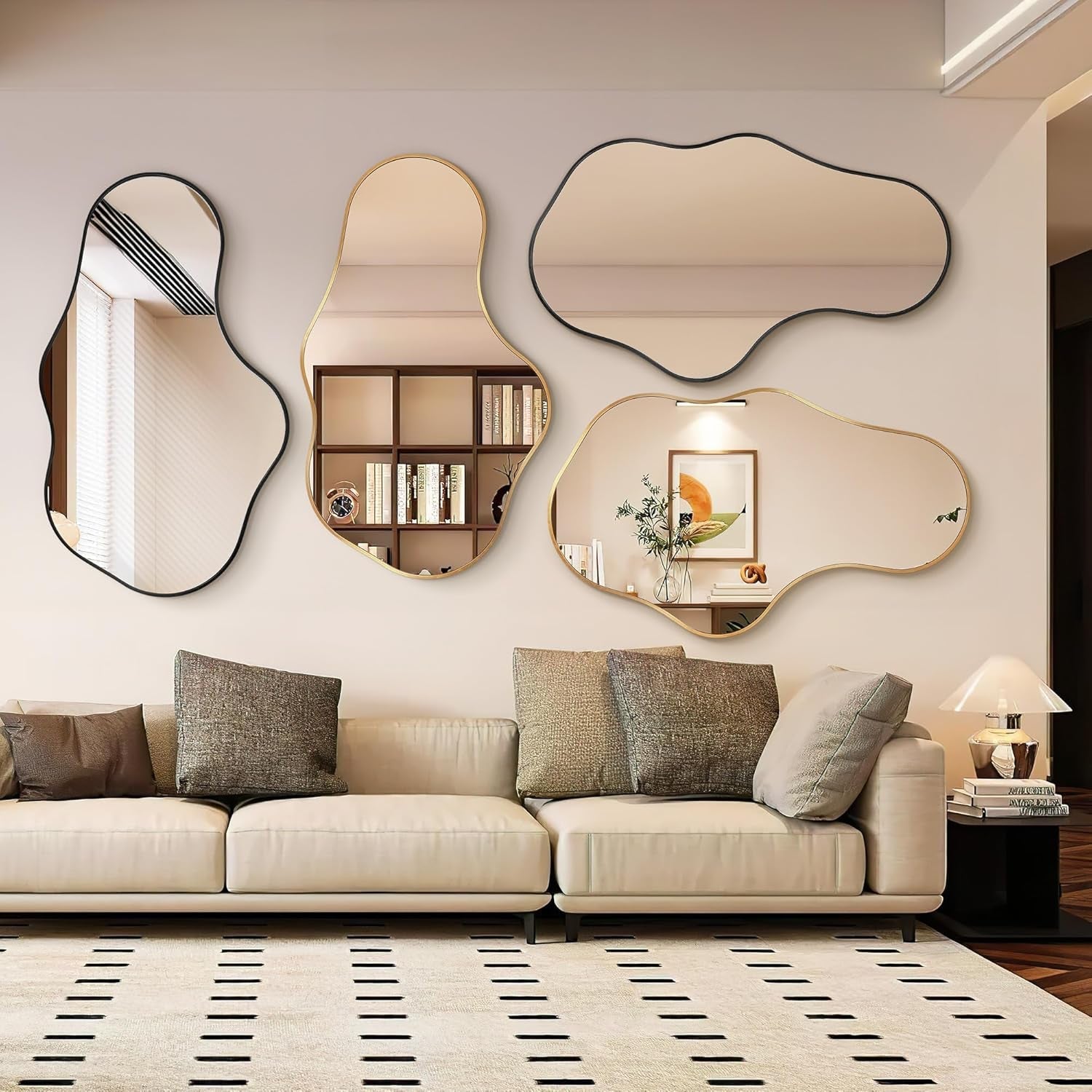 Modern living room with decorative mirrors and a beige sofa.