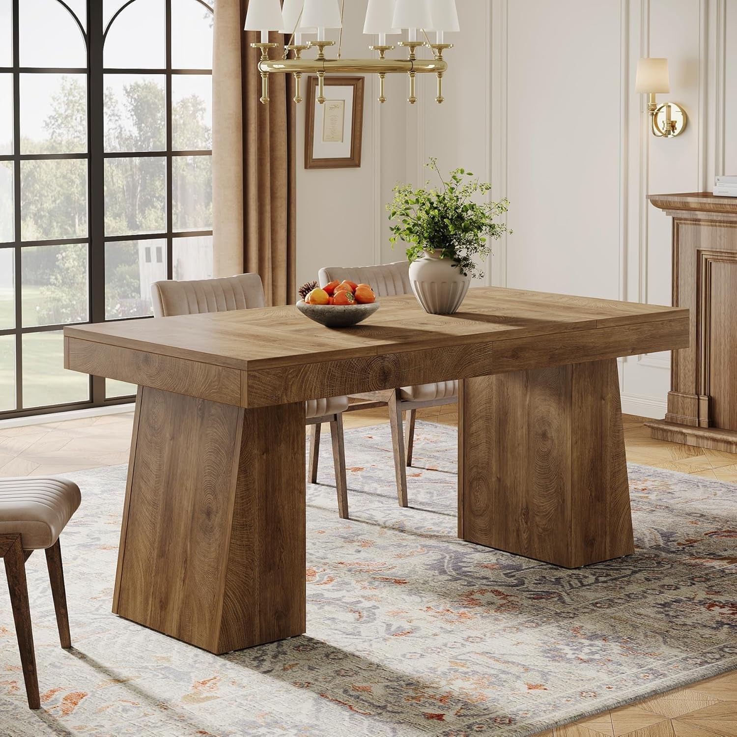Wooden dining table in a stylishly decorated room with chairs and decor.