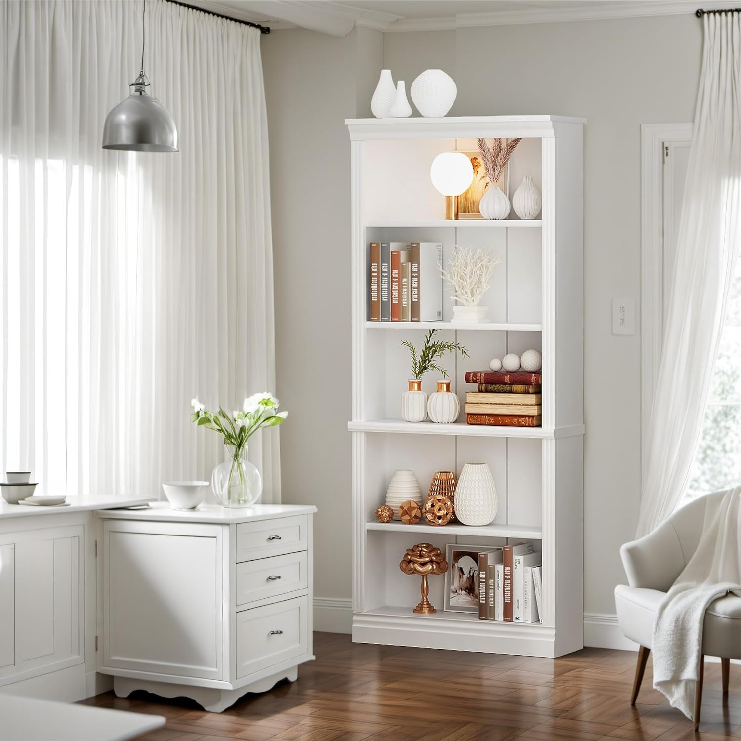 White bookshelf with decorative items in a room with curtains and a lamp.