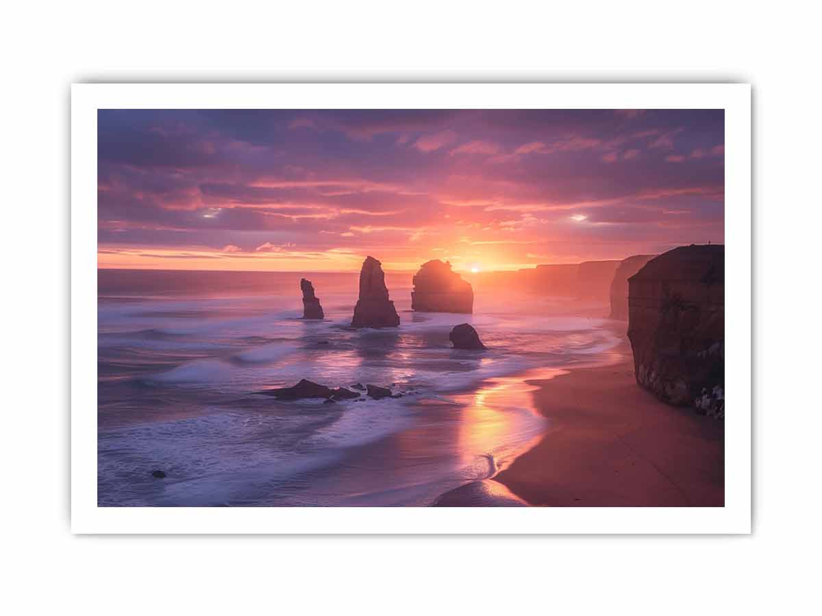 Sunset over a beach with rock formations