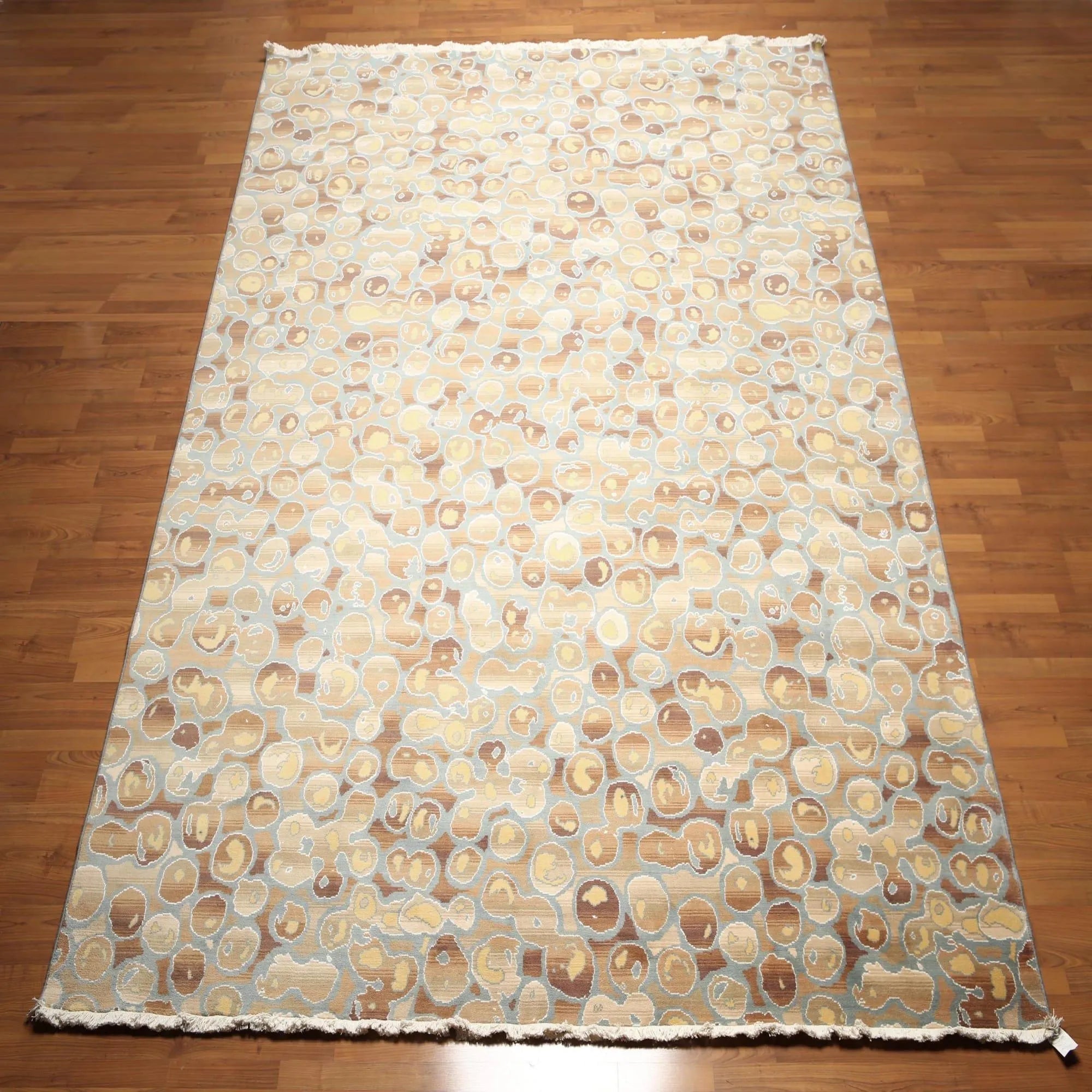 Patterned rug on a wooden floor