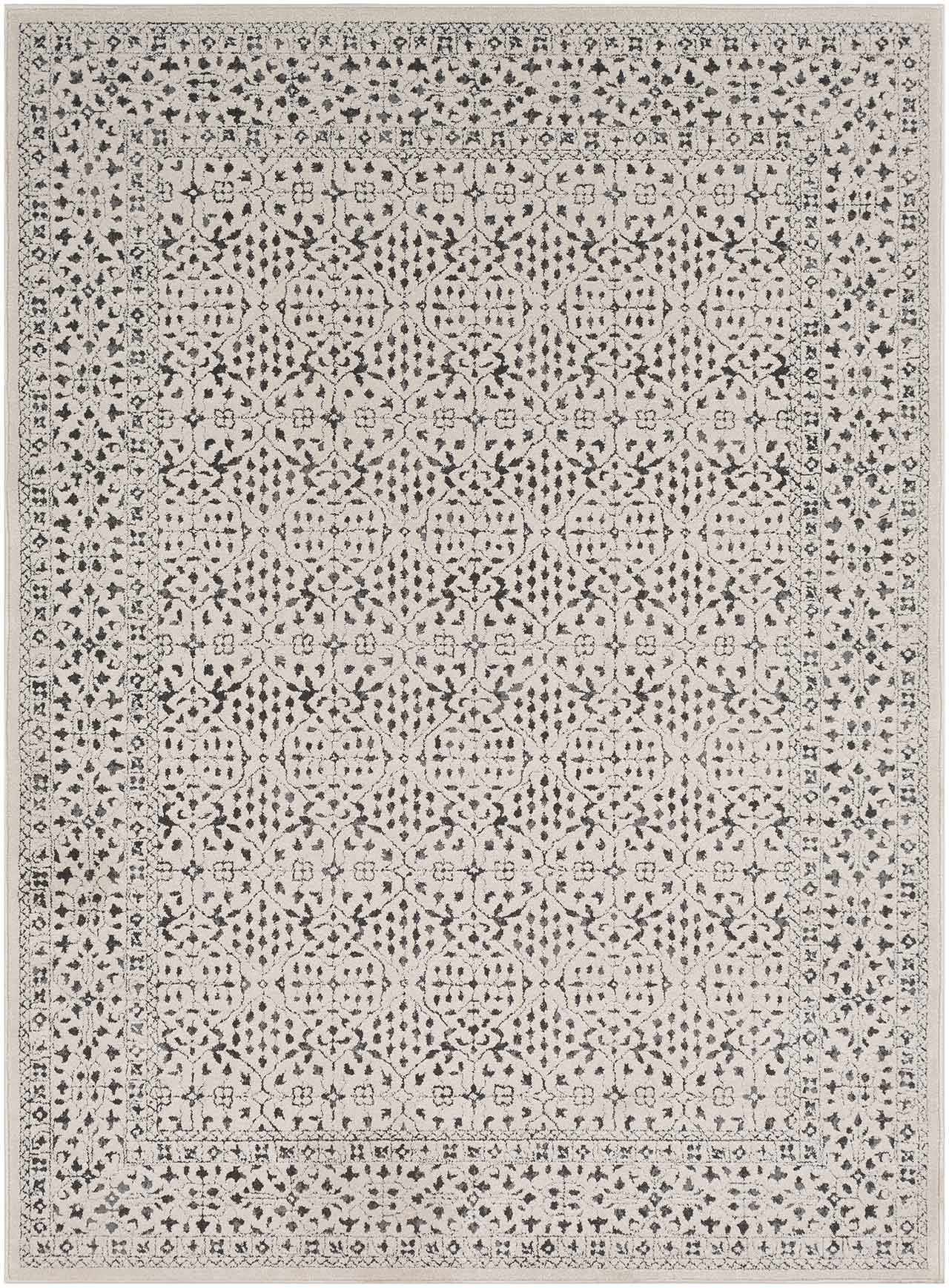 Patterned rug with geometric design on a neutral background