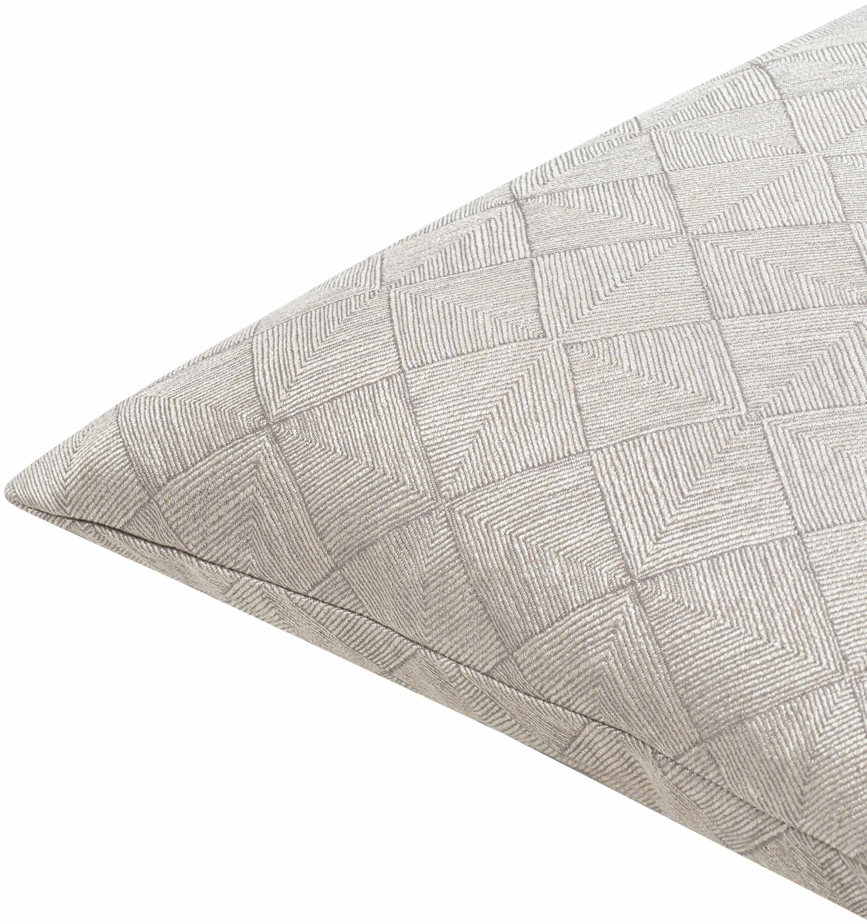 Textured pillow with geometric pattern on a white background