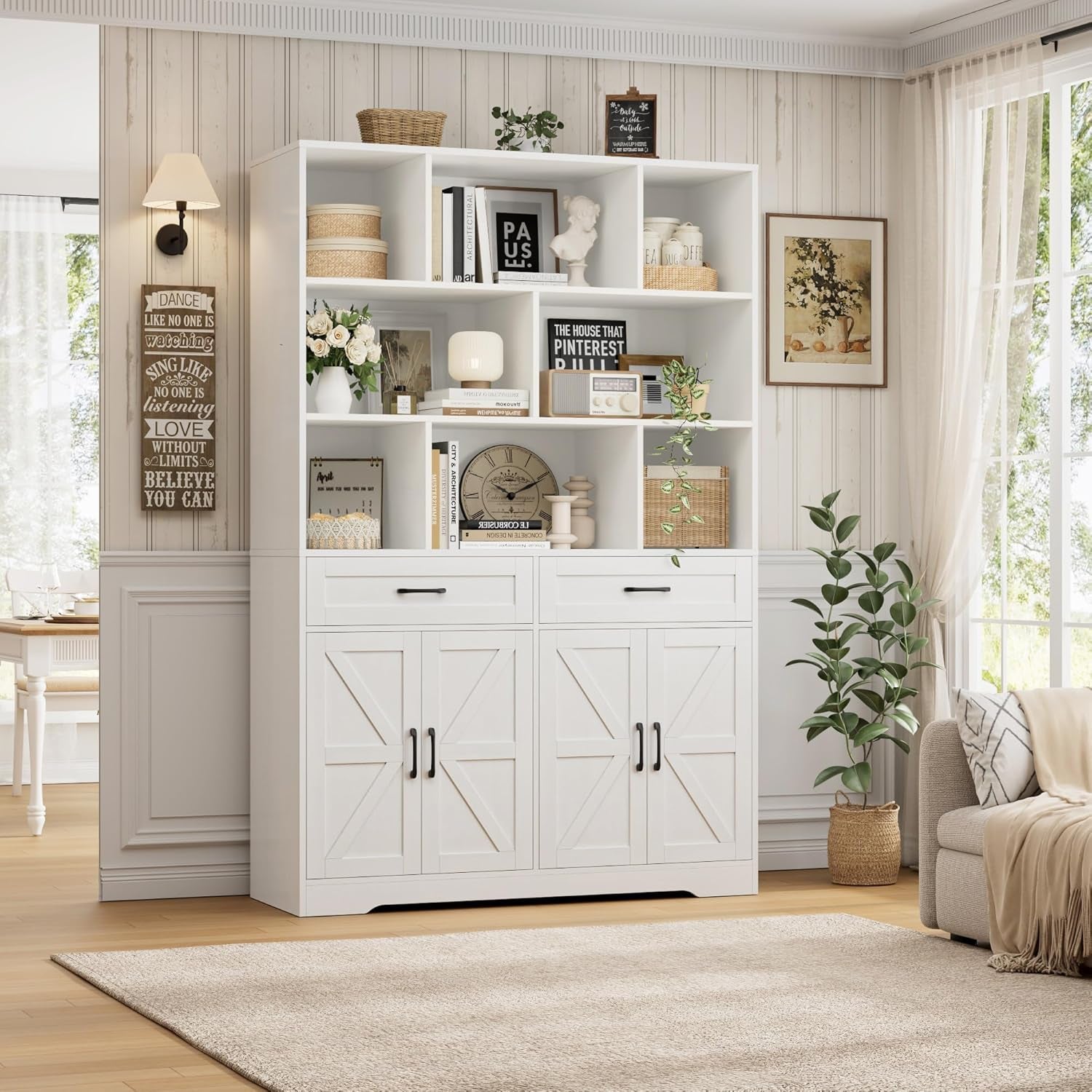 White bookshelf with decorative items in a living room setting