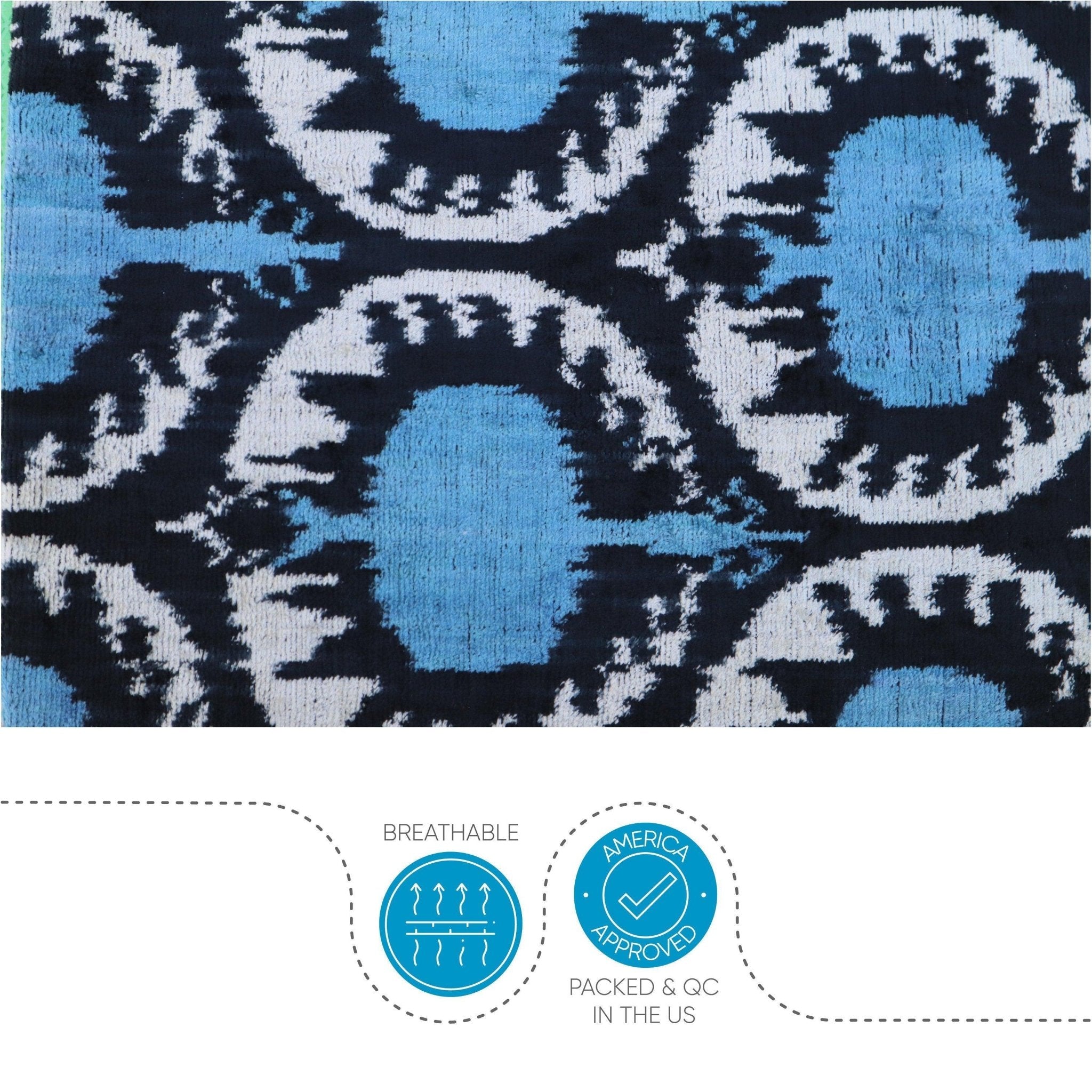 Patterned fabric with blue and black design on a white background