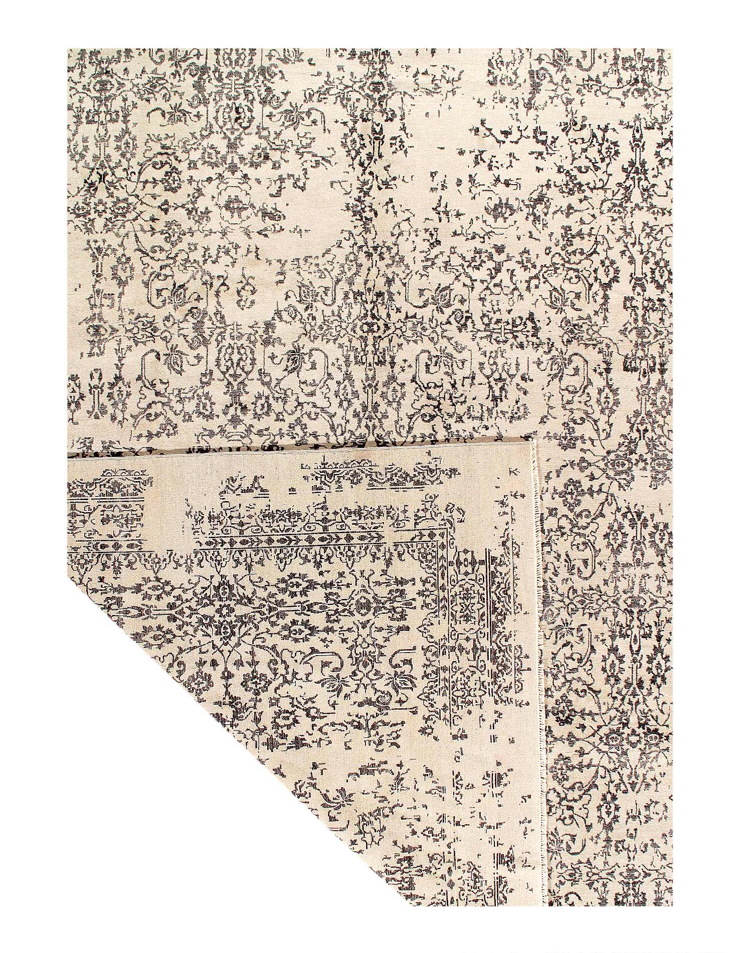 Patterned rug with black and white design on a beige background