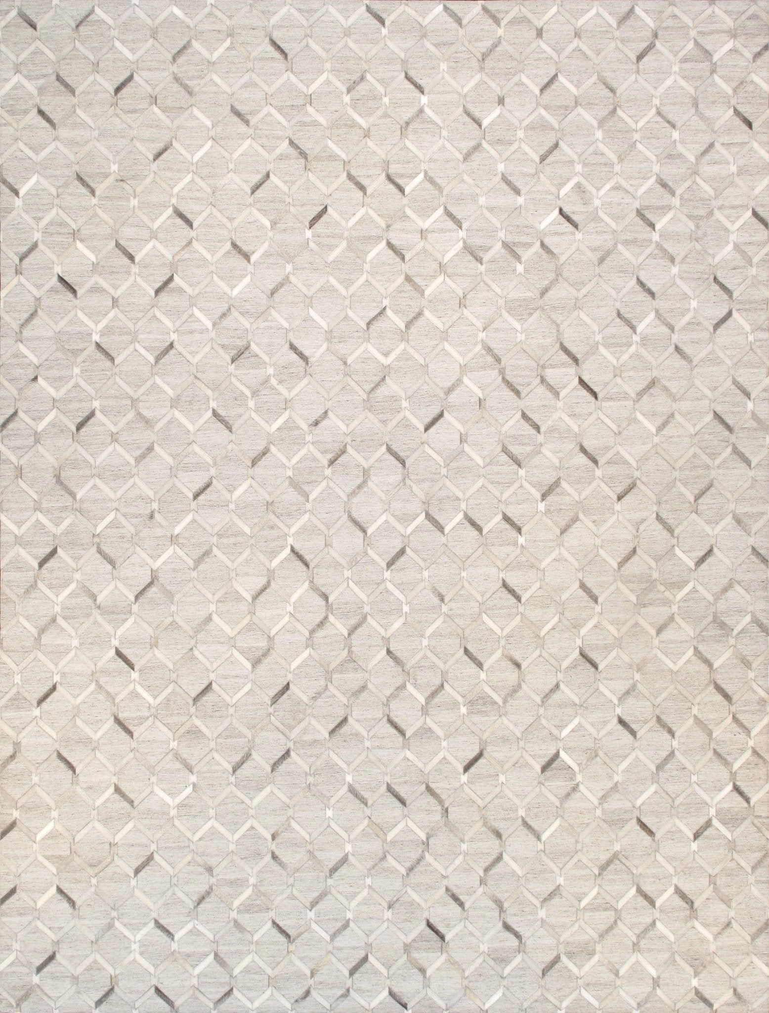 Close-up of a textured white fabric with a diamond pattern