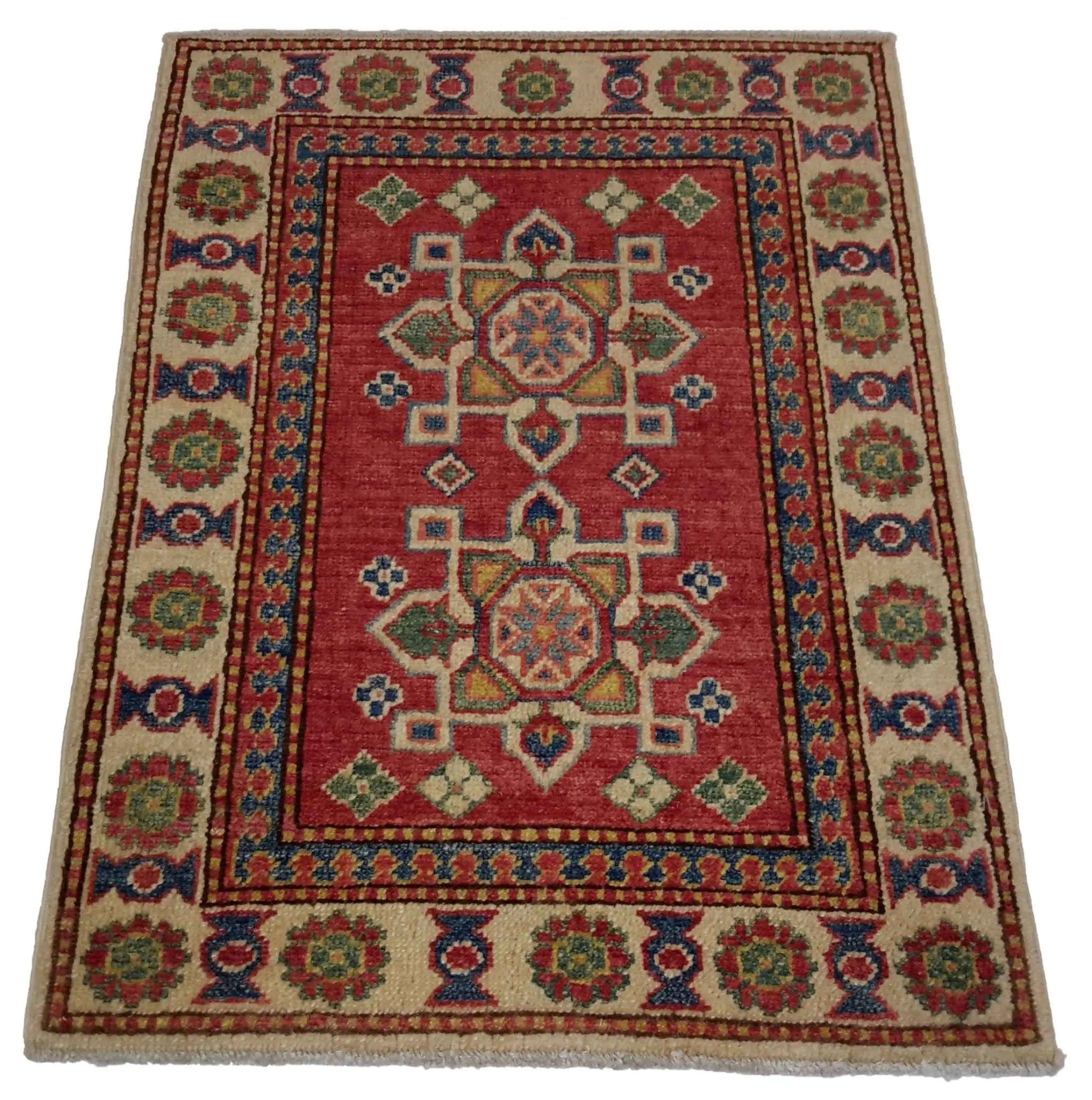 Decorative rug with intricate patterns on a white background