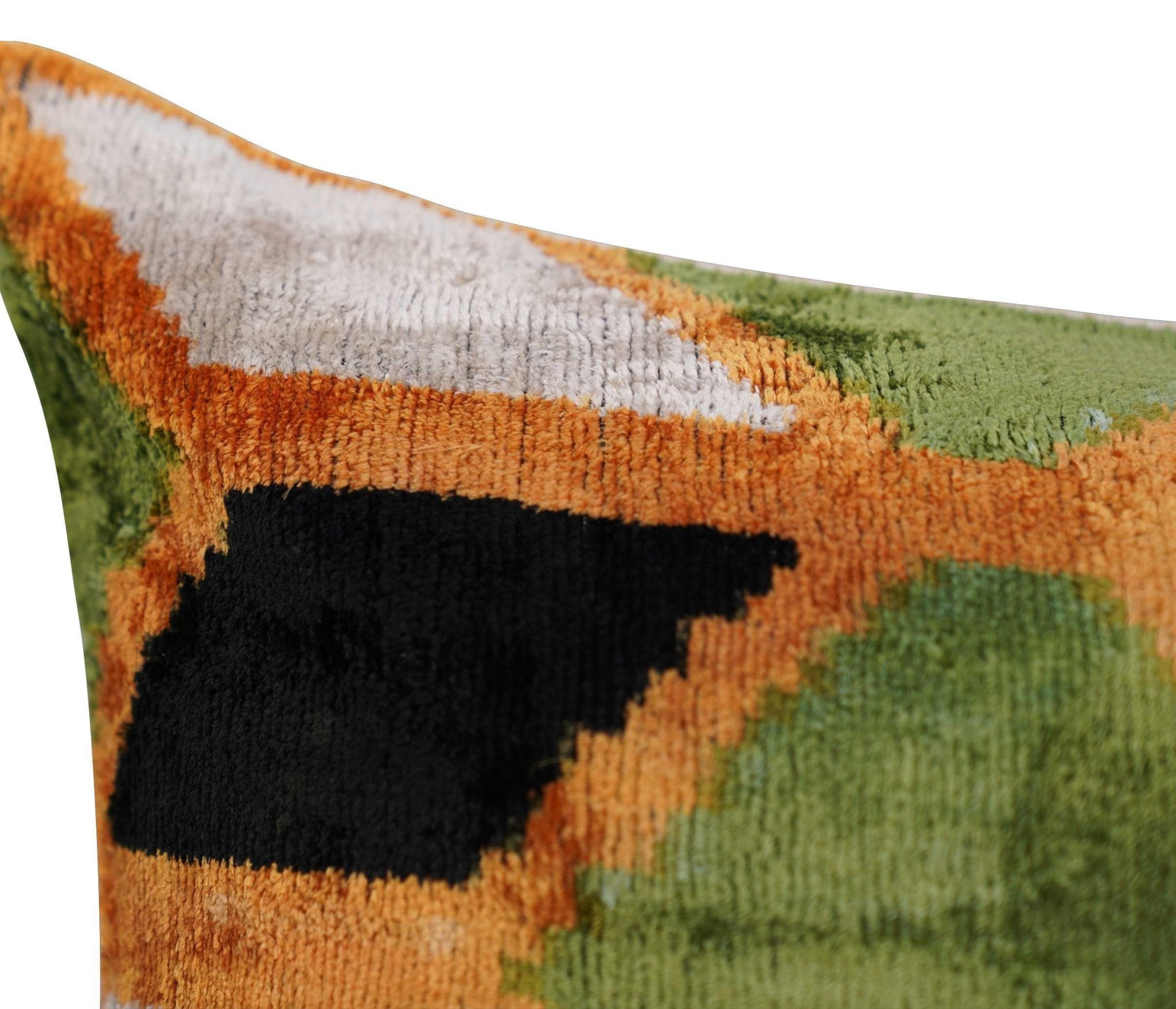 Close-up of a textured pillow with geometric pattern on a white background