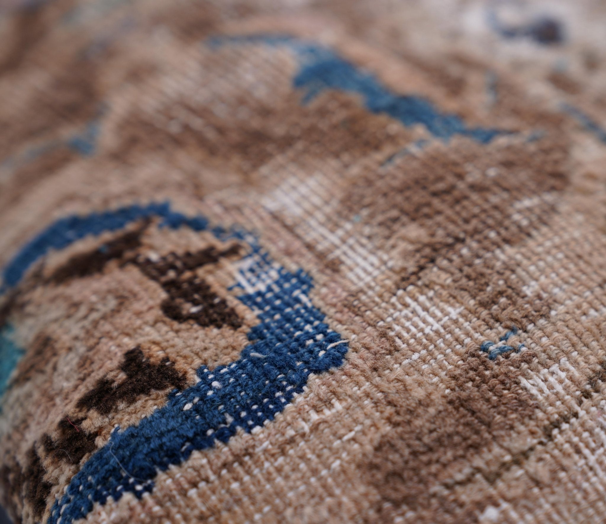 Close-up of a textured surface with blue and brown patterns