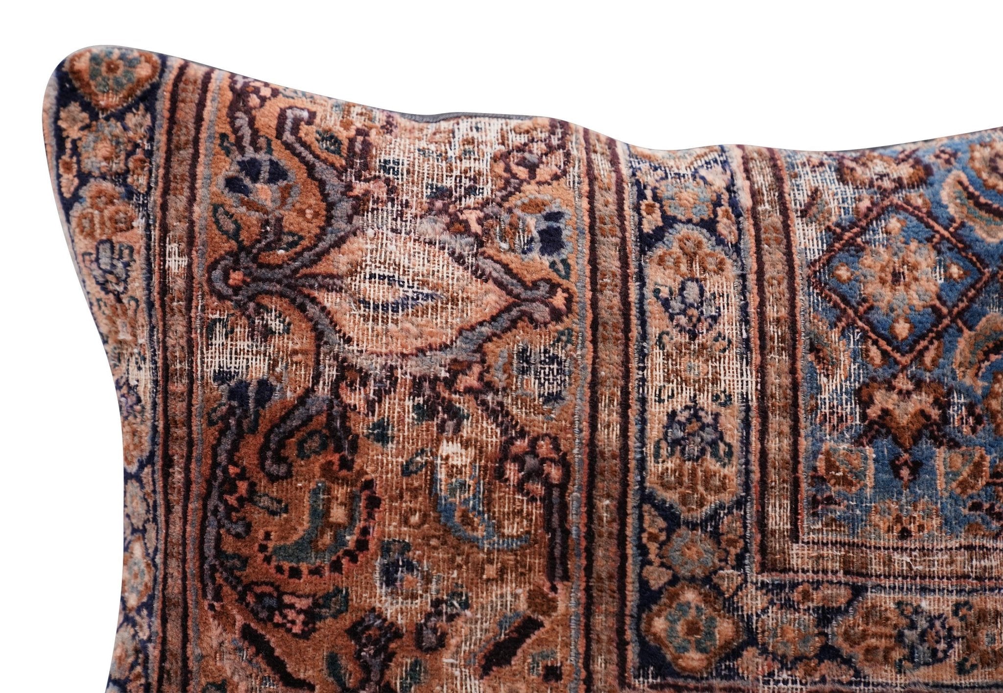 Close-up of a patterned rug with intricate designs.