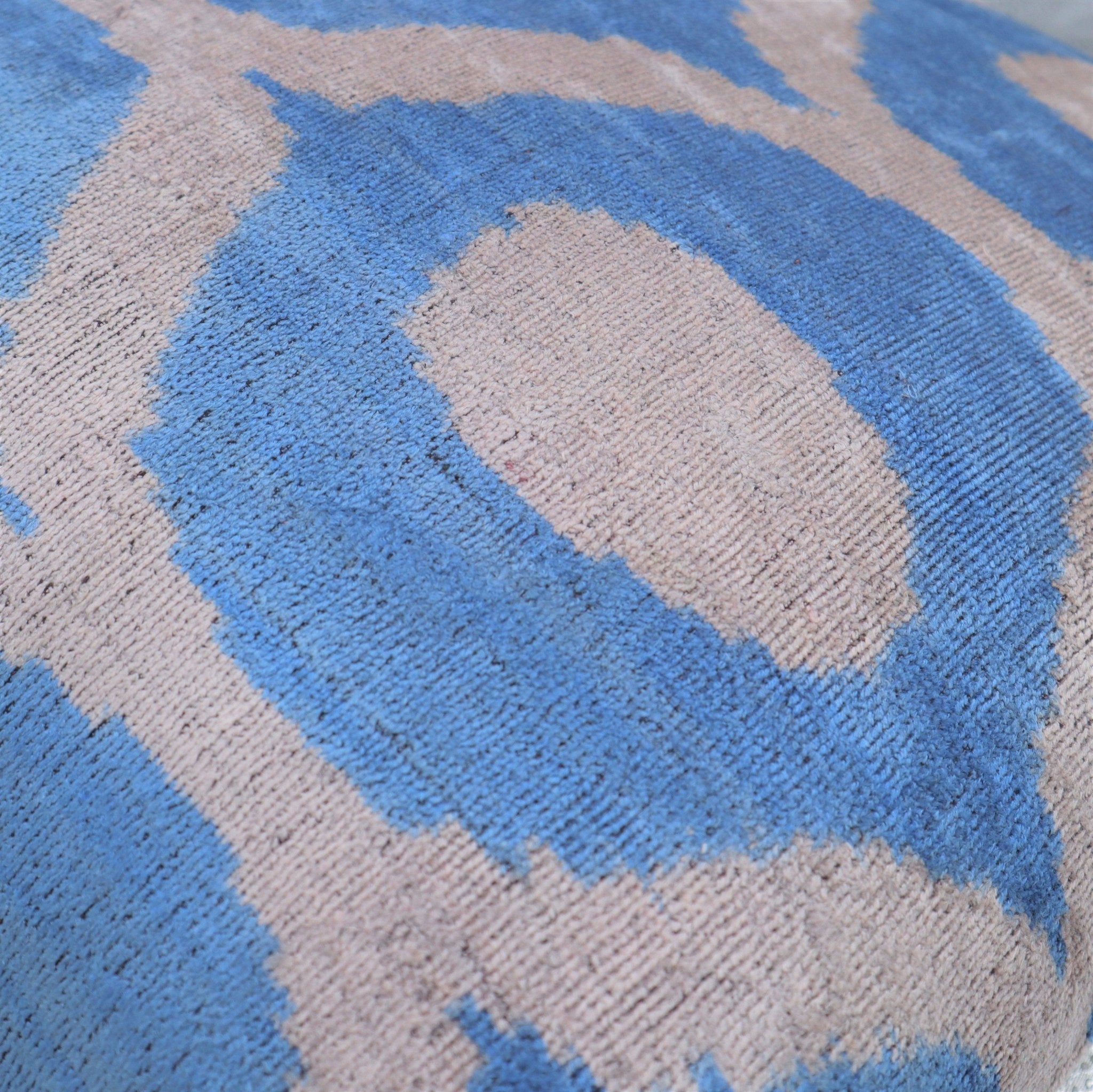Close-up of a textured fabric with blue and gray pattern
