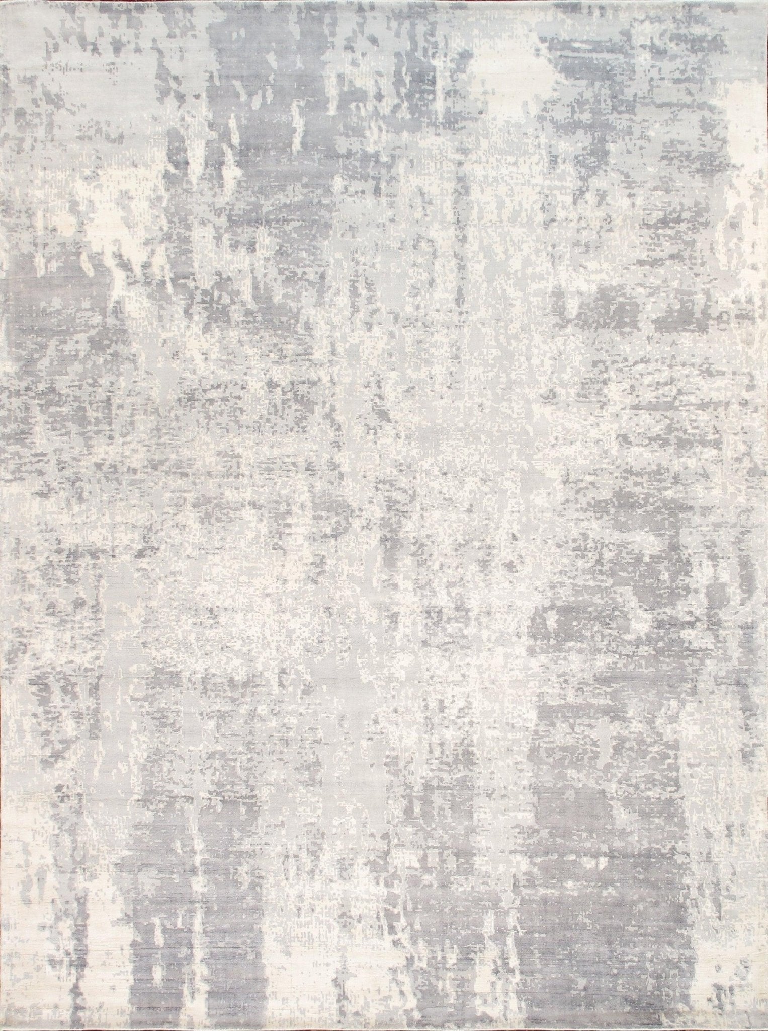 Textured gray and white area rug with abstract pattern