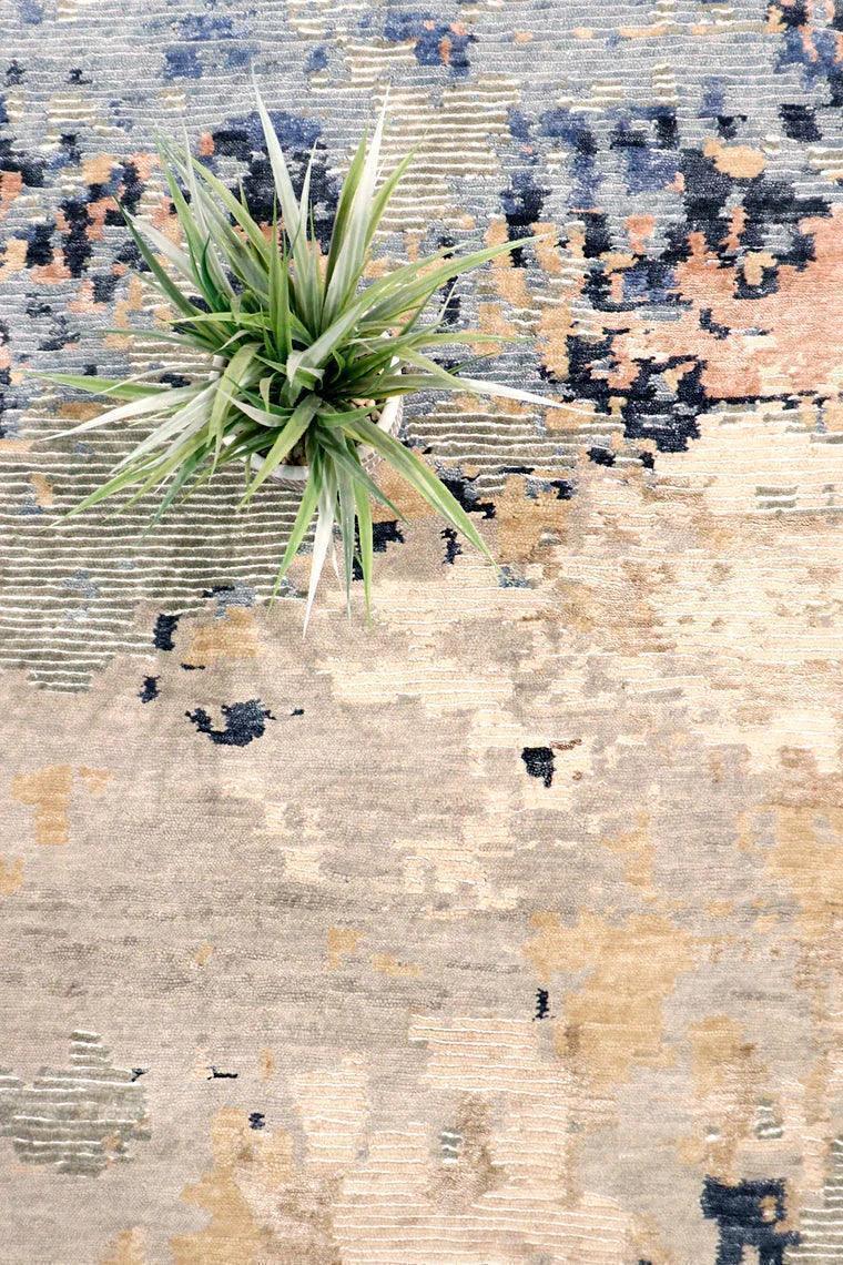 Textured rug with a plant on top