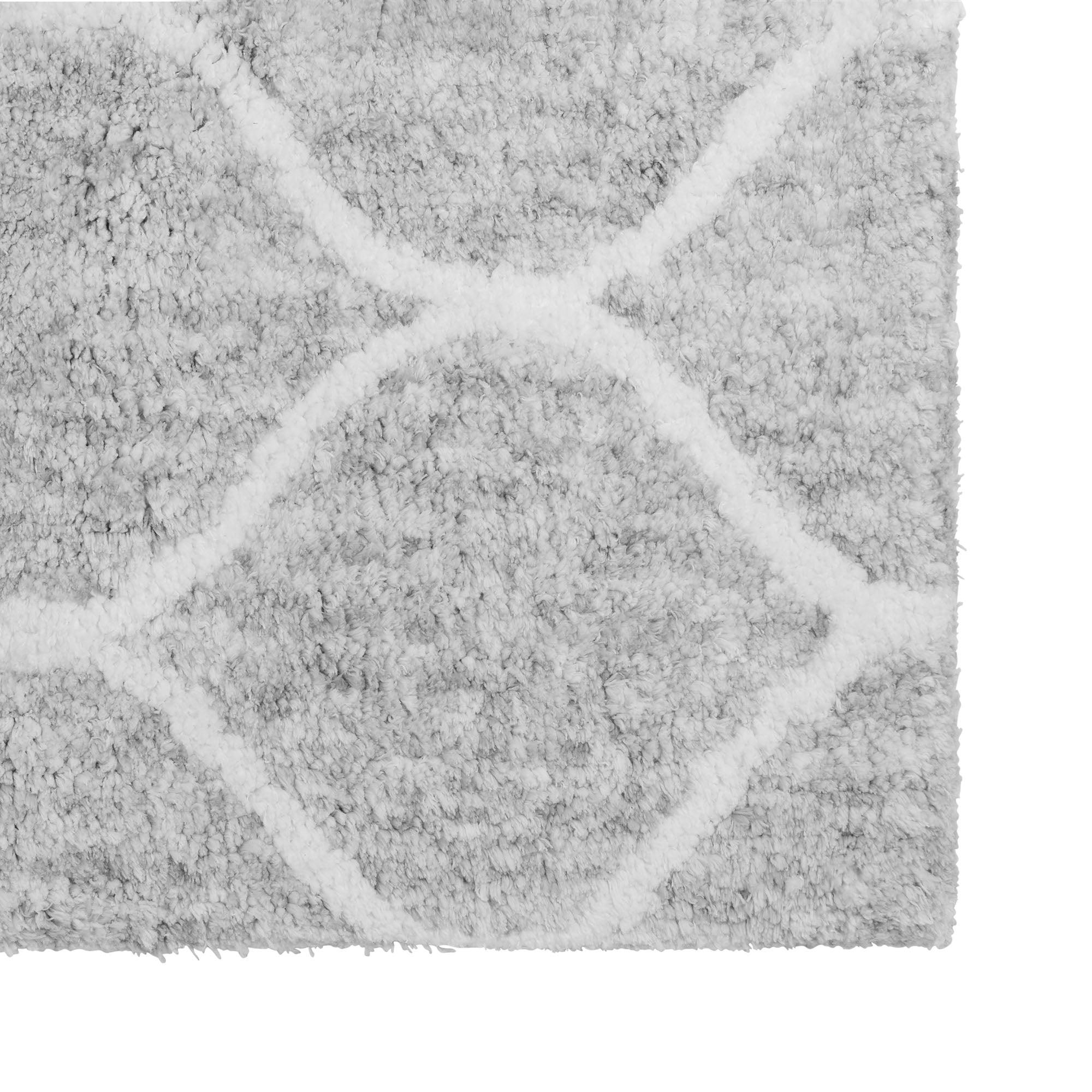 Gray textured rug with a geometric pattern on a white background