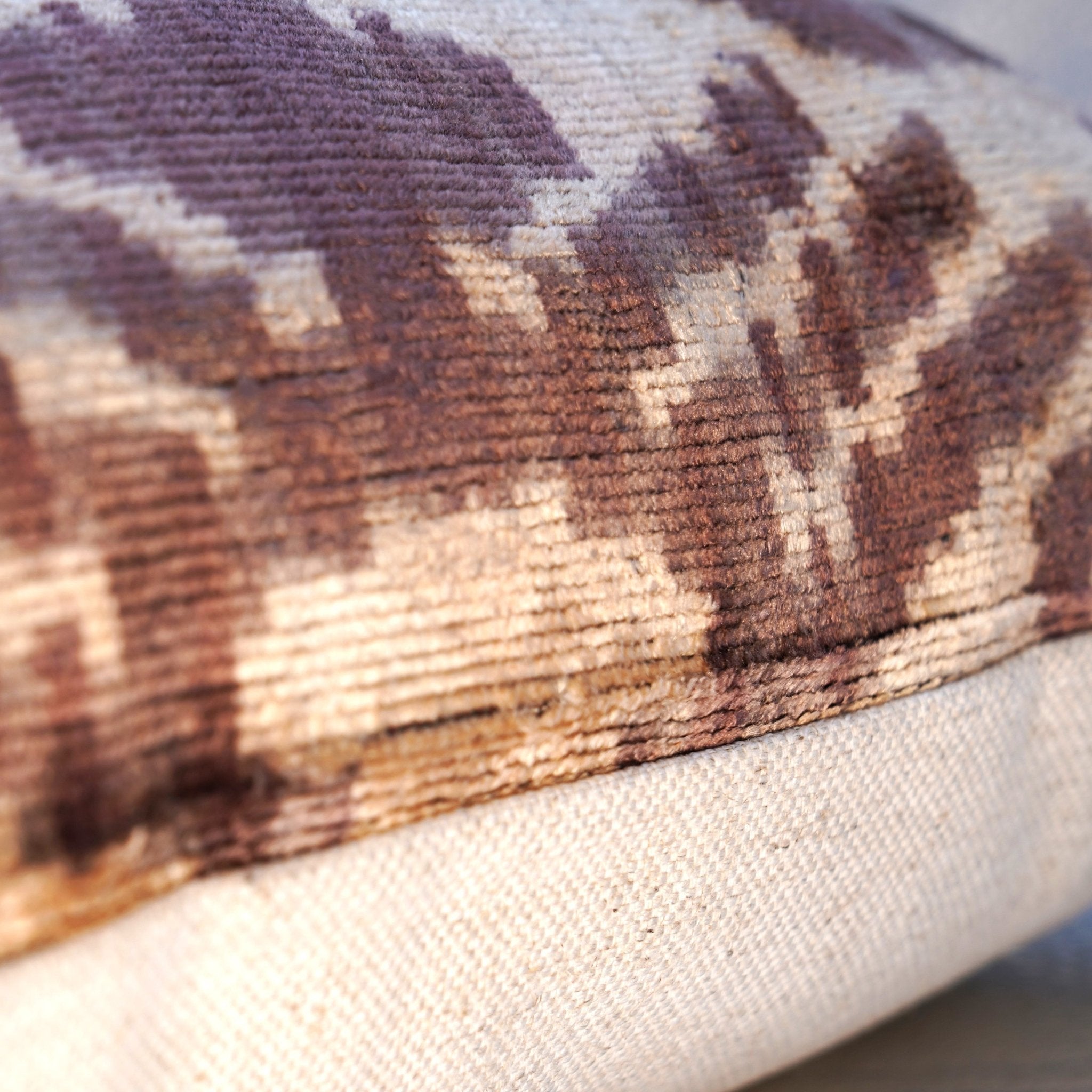 Close-up of a textured fabric surface with a patterned design.
