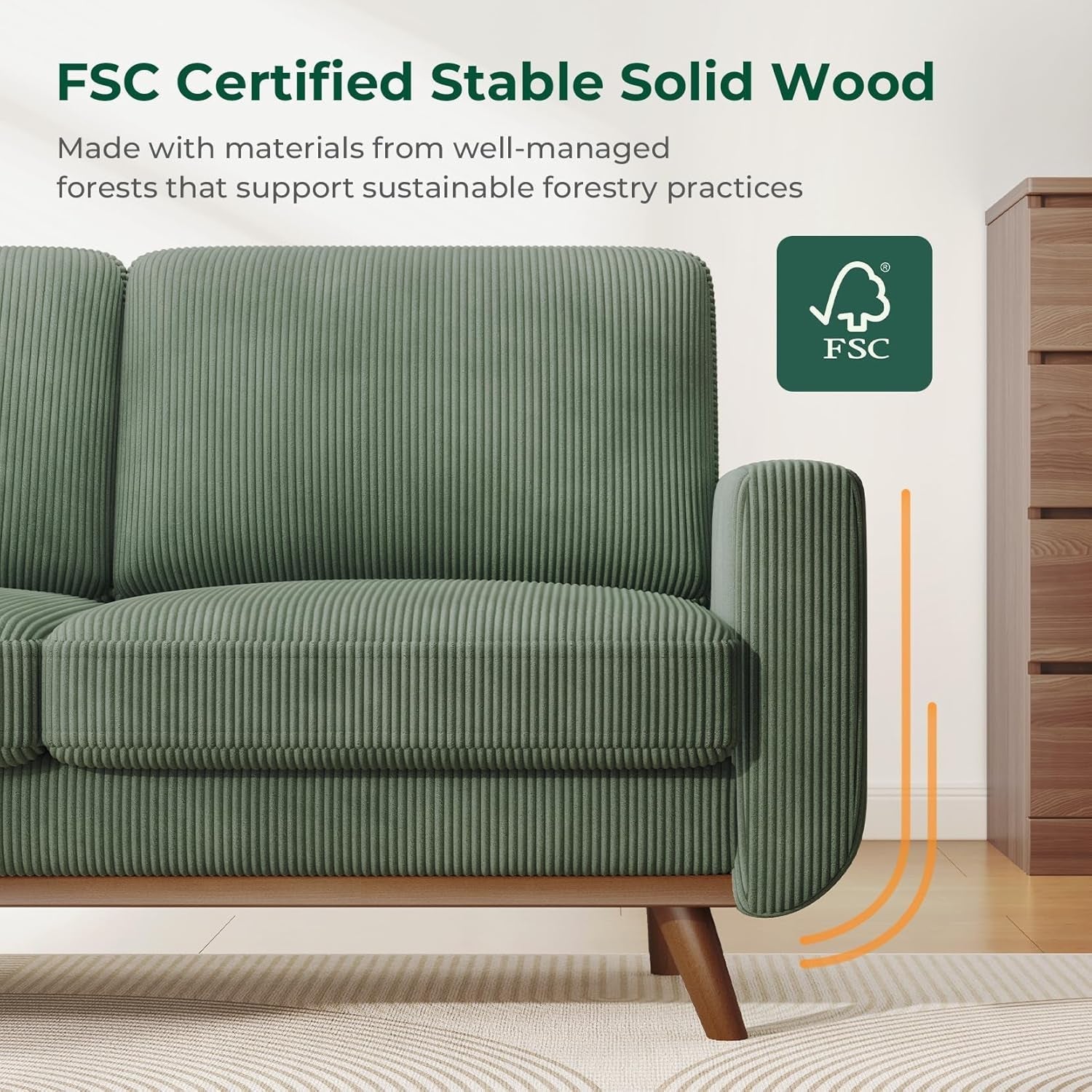 Green sofa with FSC certified stable solid wood label in a room setting.