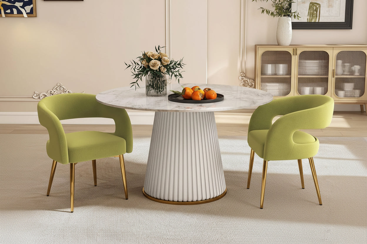 Modern high back dining chairs with a table and decorative elements in a room setting.