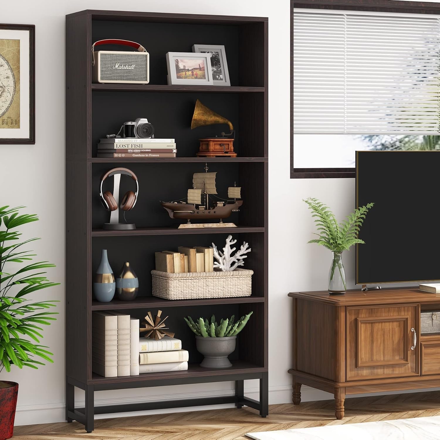 Tall dark wood bookshelf with decorative items in a living room setting.