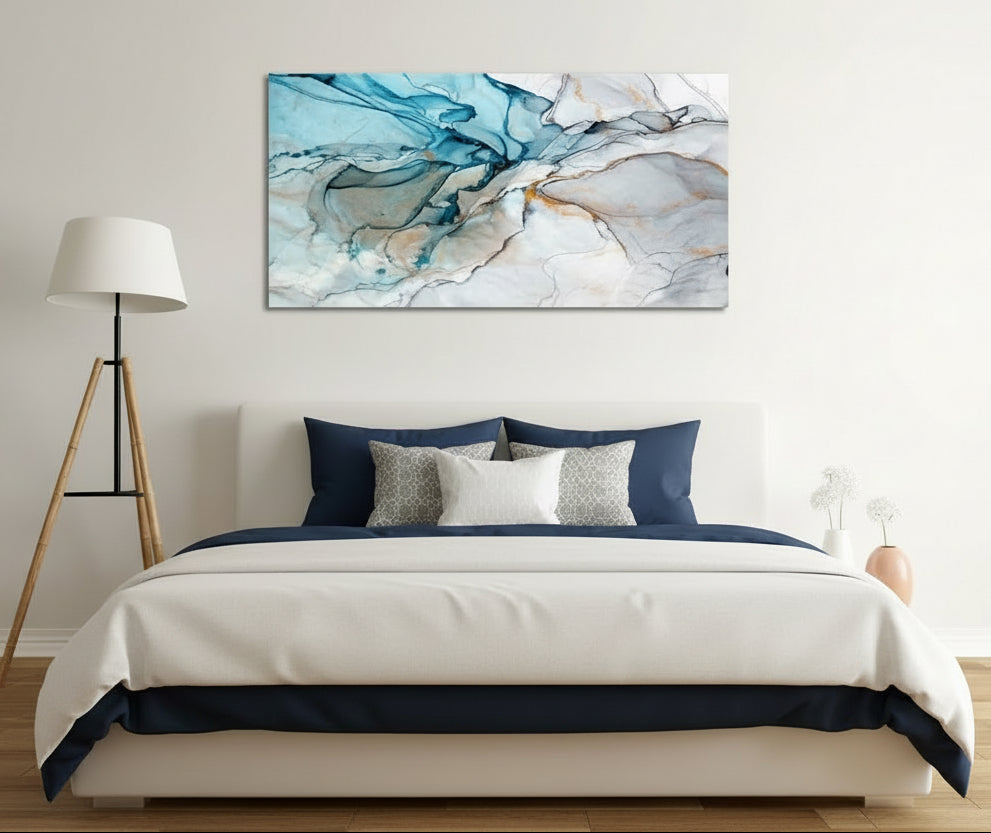 Bedroom with wooden bed, abstract painting on wall, and lamp.