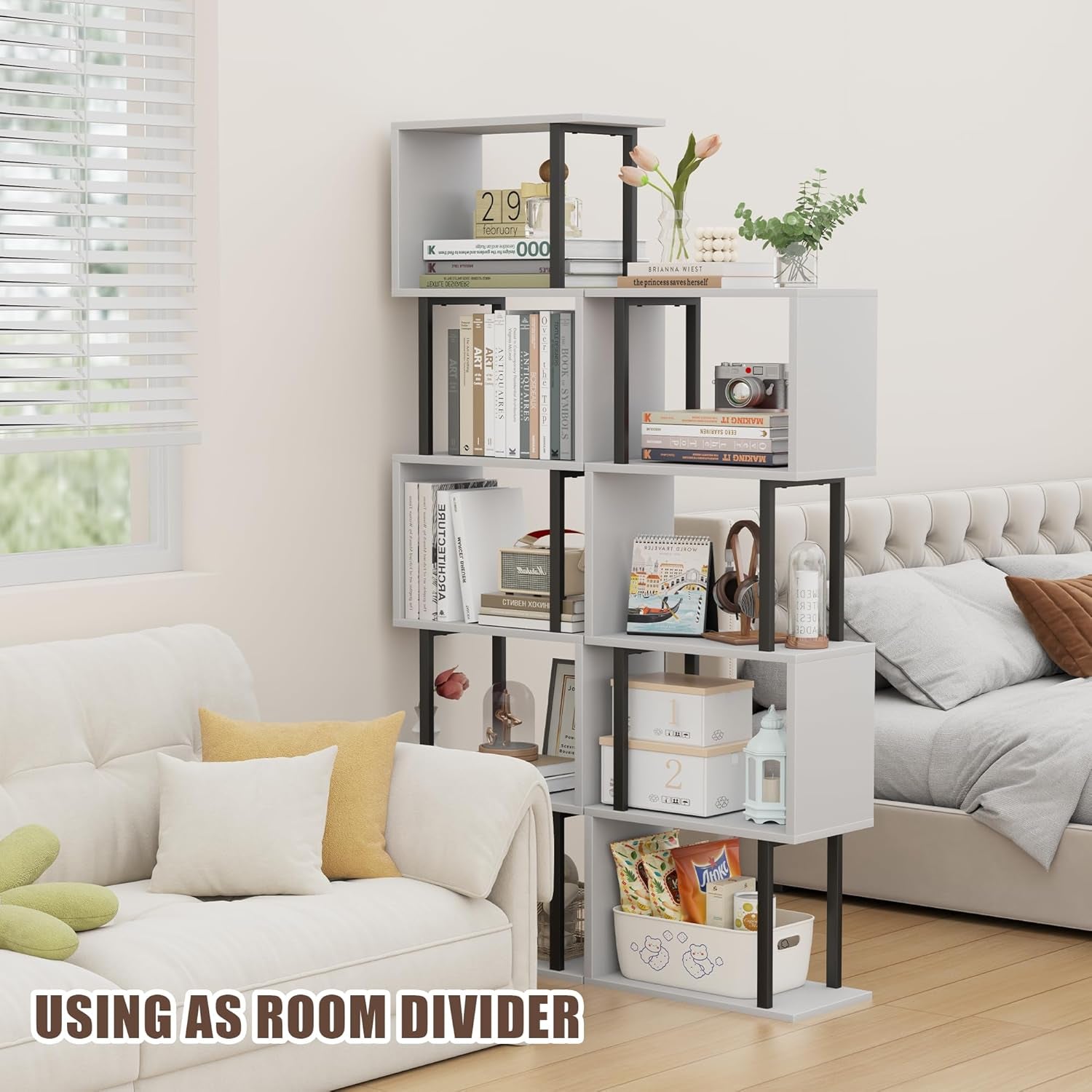 Room divider with books and decor items in a living room setting