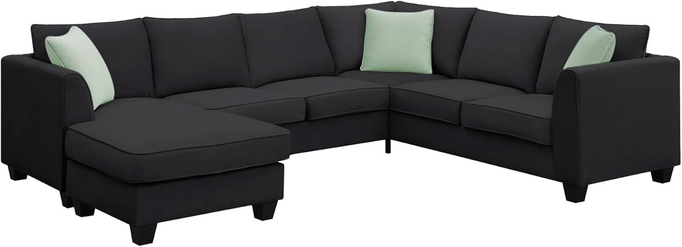 Black sectional sofa with light green cushions on a white background