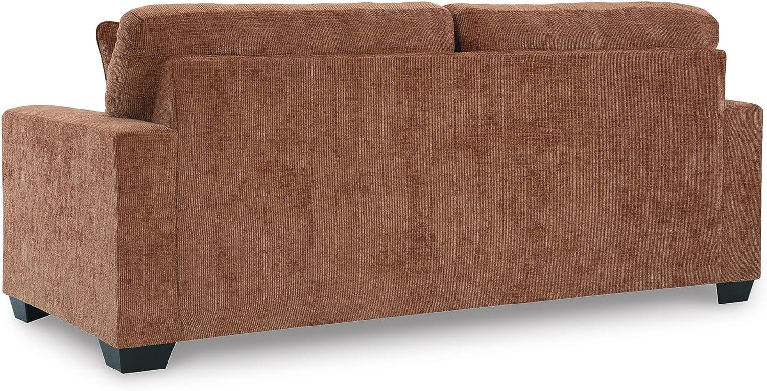 Brown fabric sofa on a white background