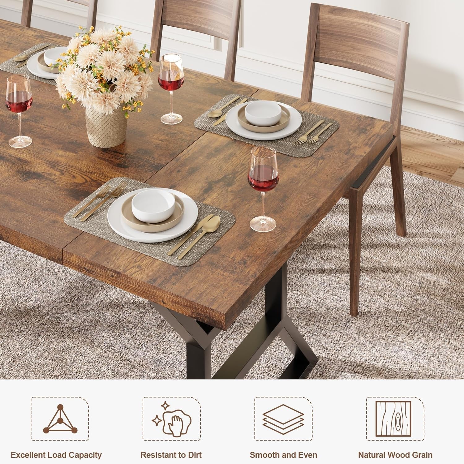 Dining table set with chairs, plates, and glasses in a home setting.