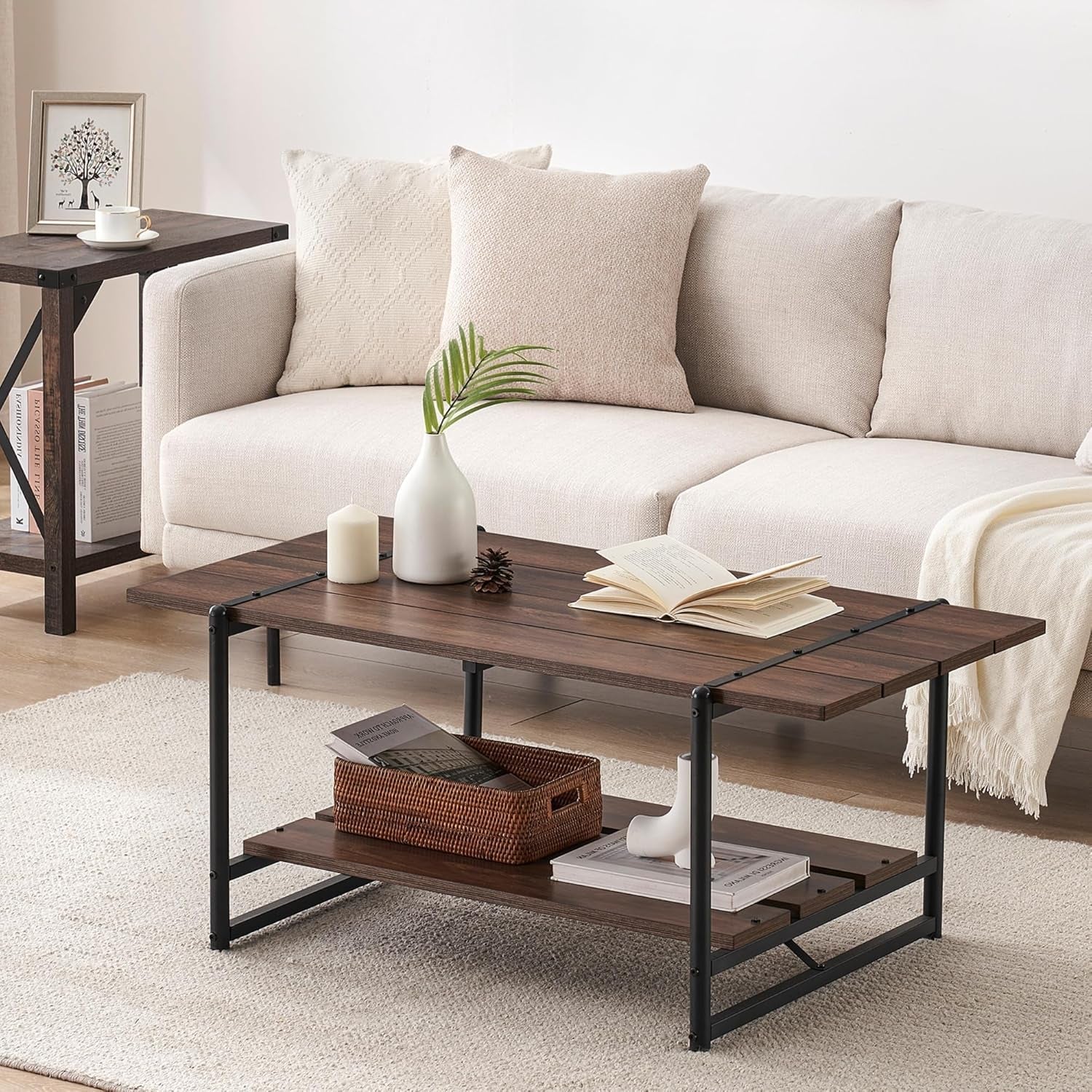 Living room with a wooden coffee table, white sofa, and decorative items.
