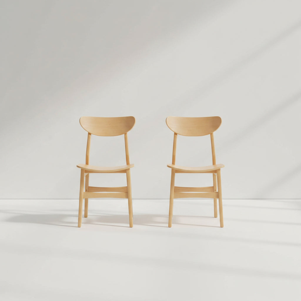 Two wooden bar stools on a white background