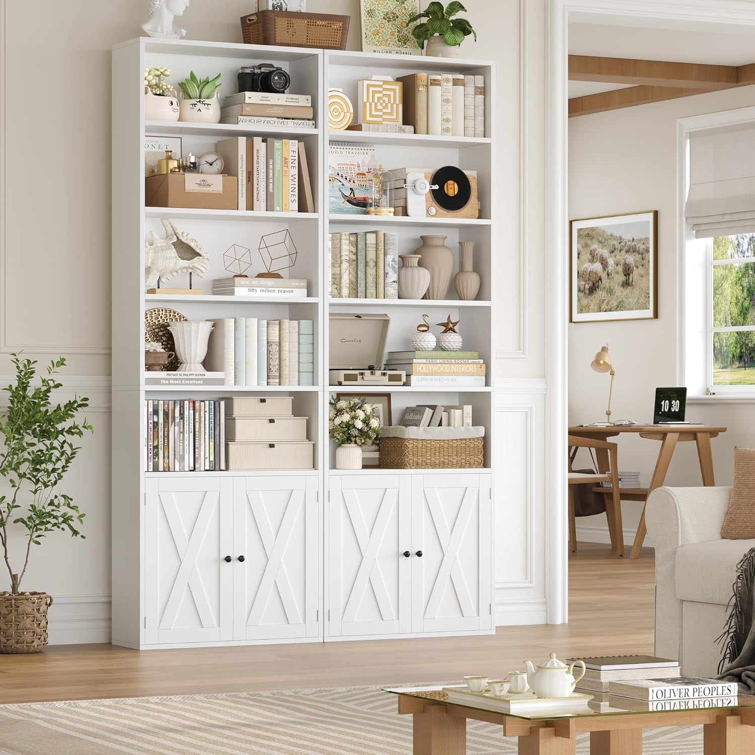 White bookshelf with decorative items in a living room setting