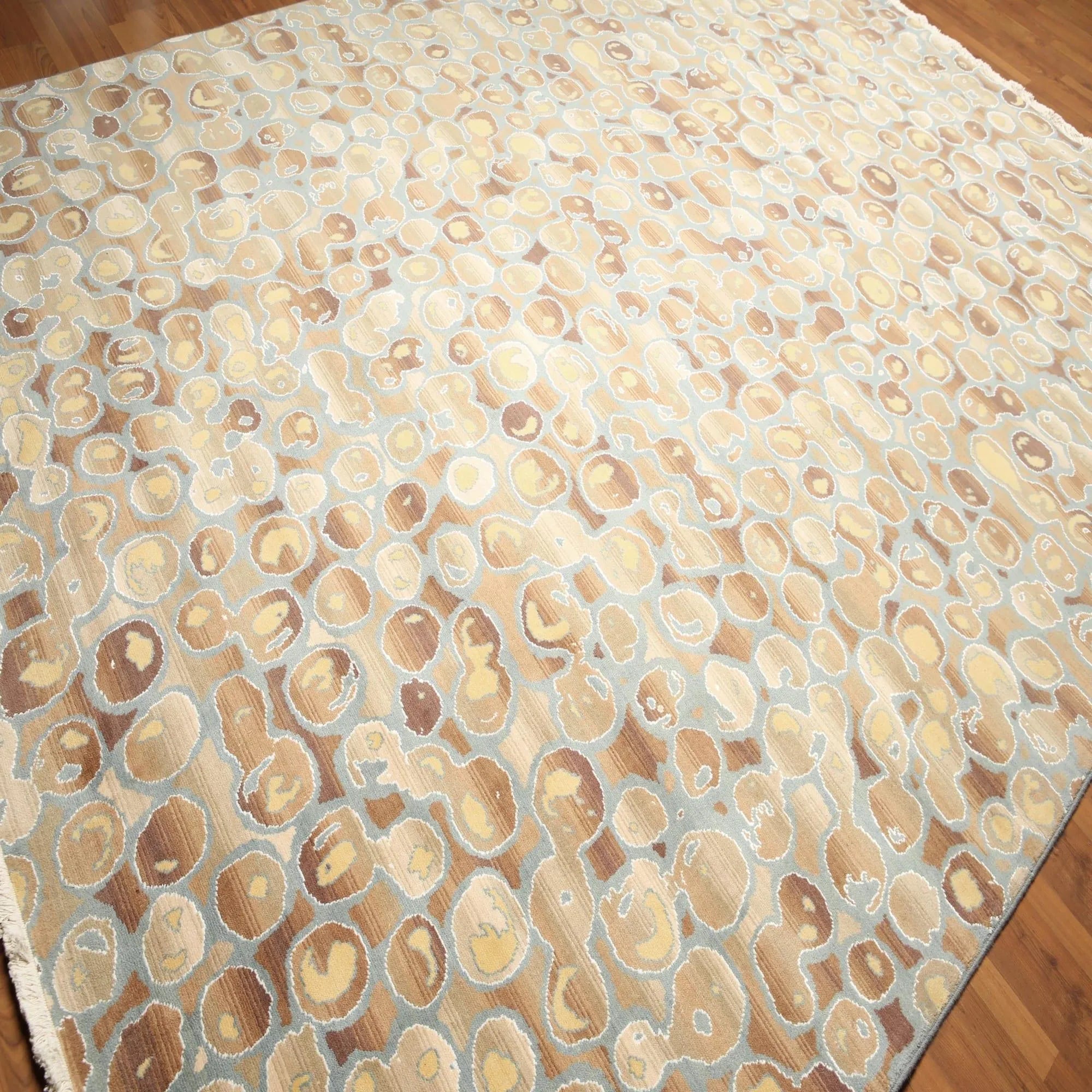 Patterned rug with circular designs on a wooden floor
