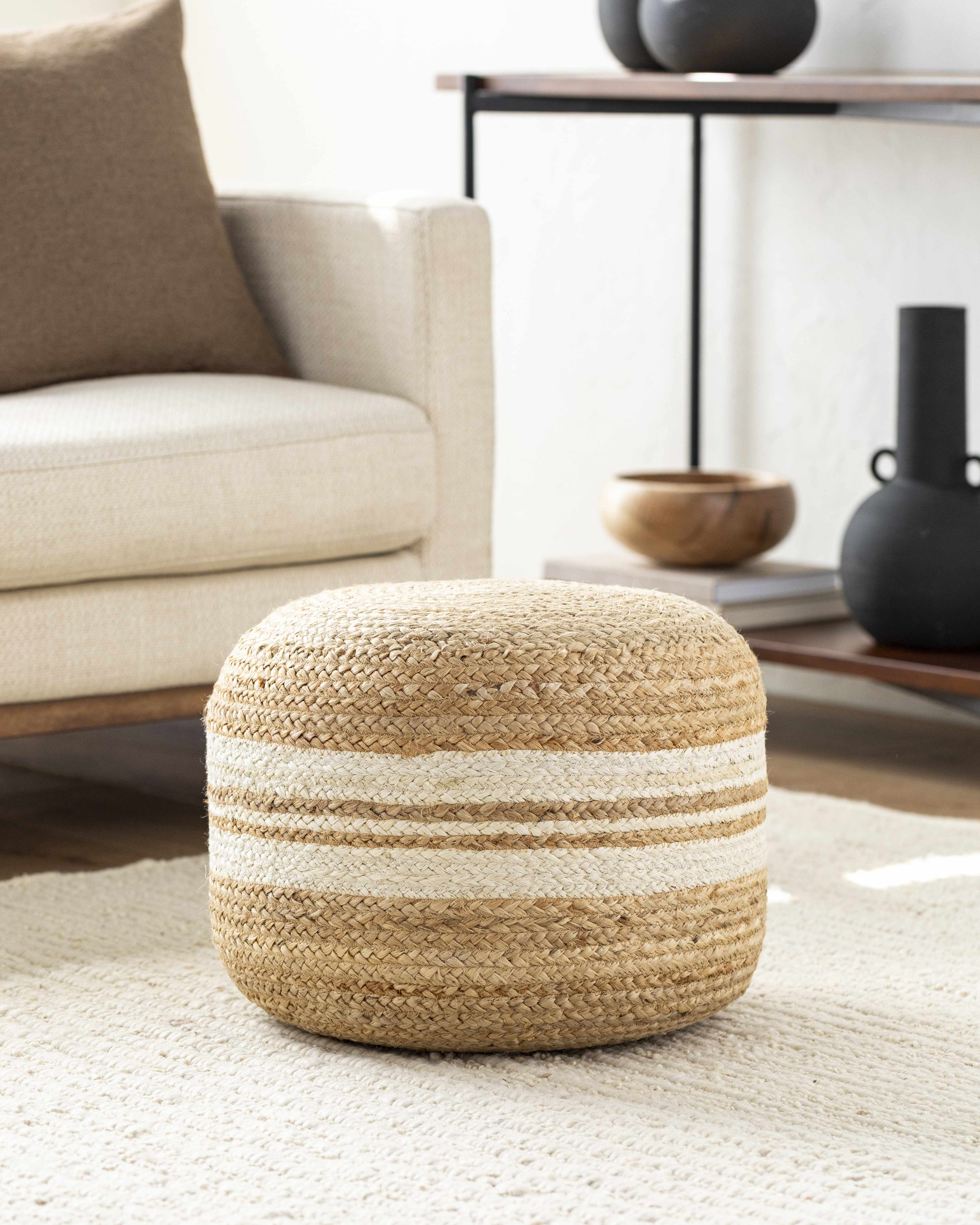 Woven ottoman with striped design in a living room setting
