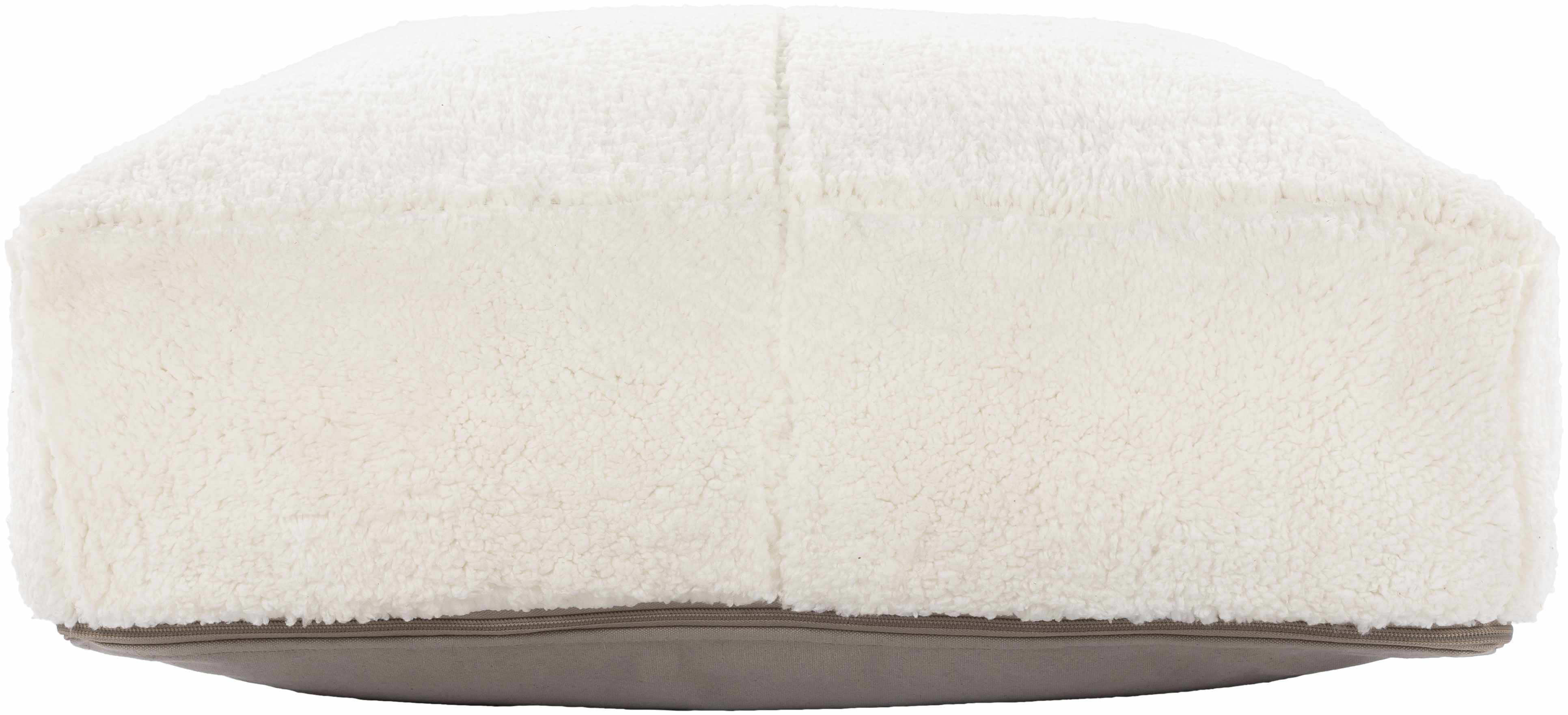 Round white cushion with a gray base on a white background