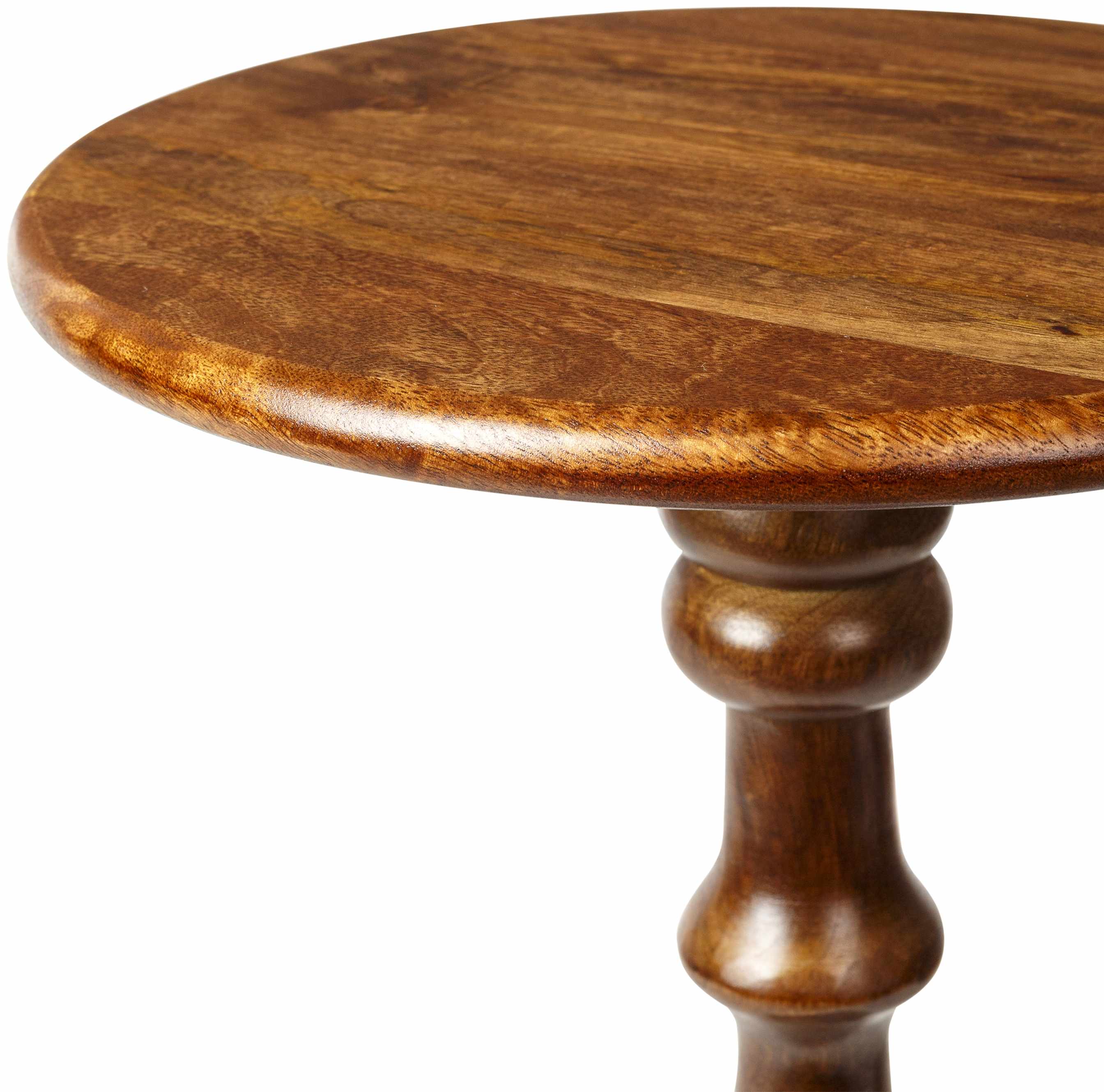 Wooden round table with a pedestal base on a white background
