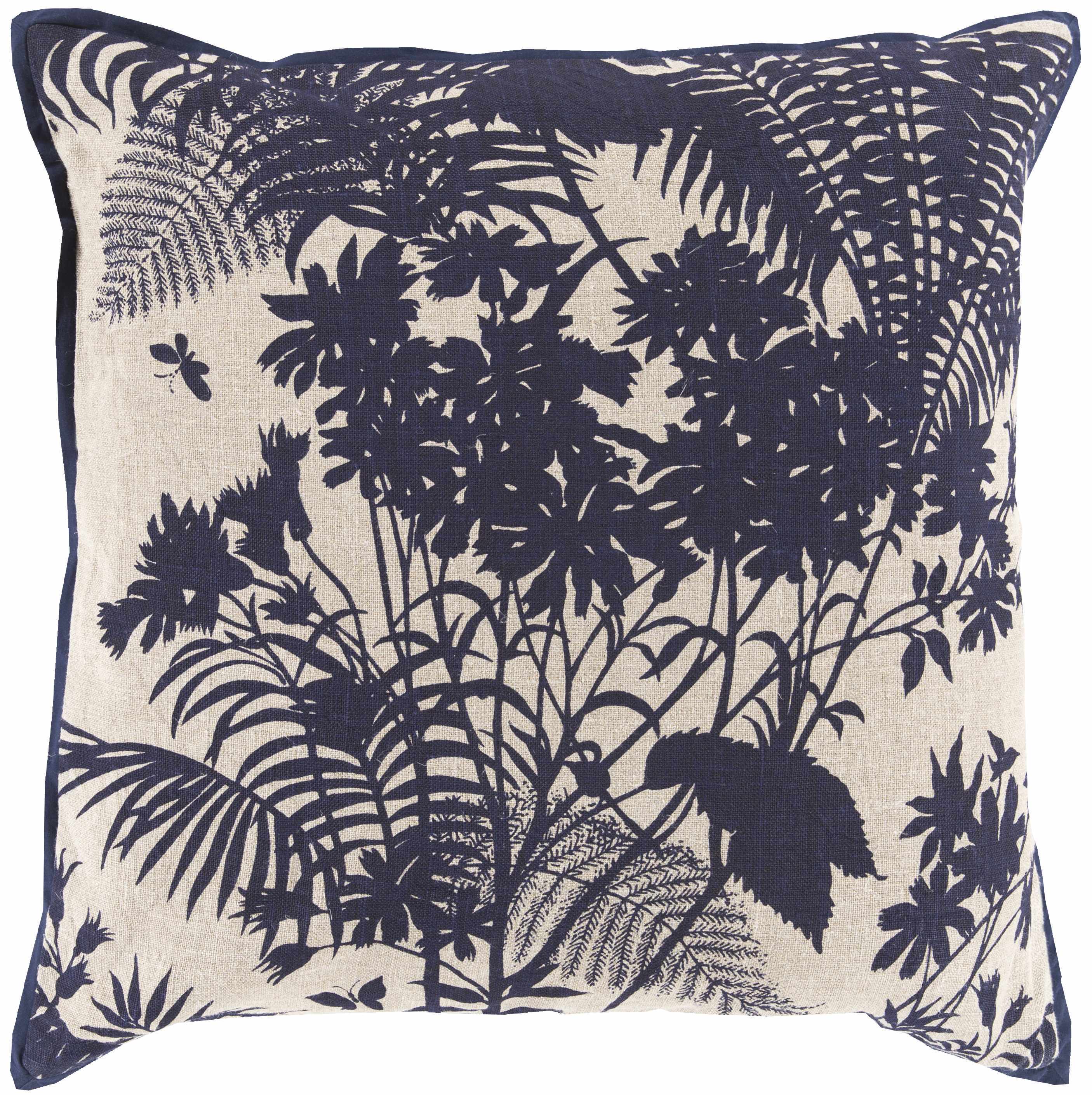 Decorative pillow with navy botanical pattern on a beige background