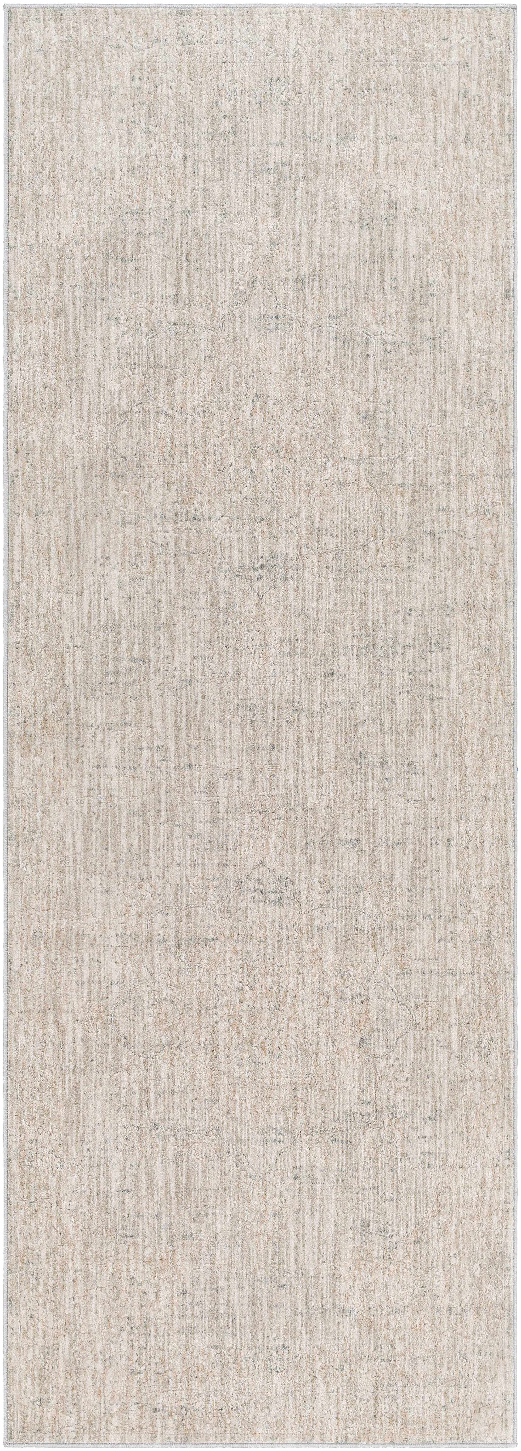 Textured beige rug with a subtle pattern on a plain background