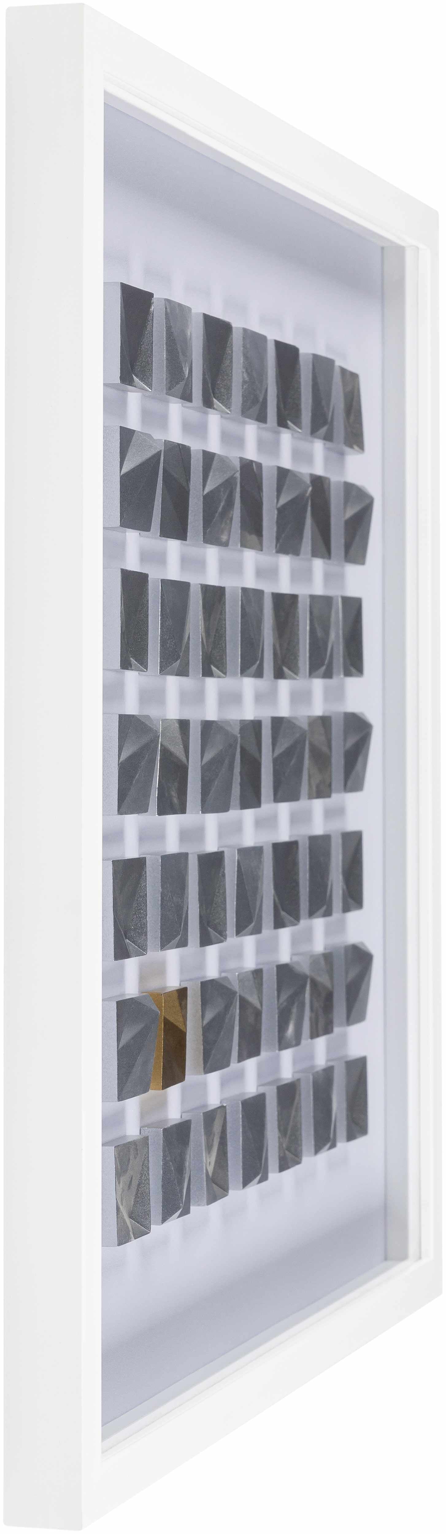 Framed abstract art with geometric patterns in gray tones.