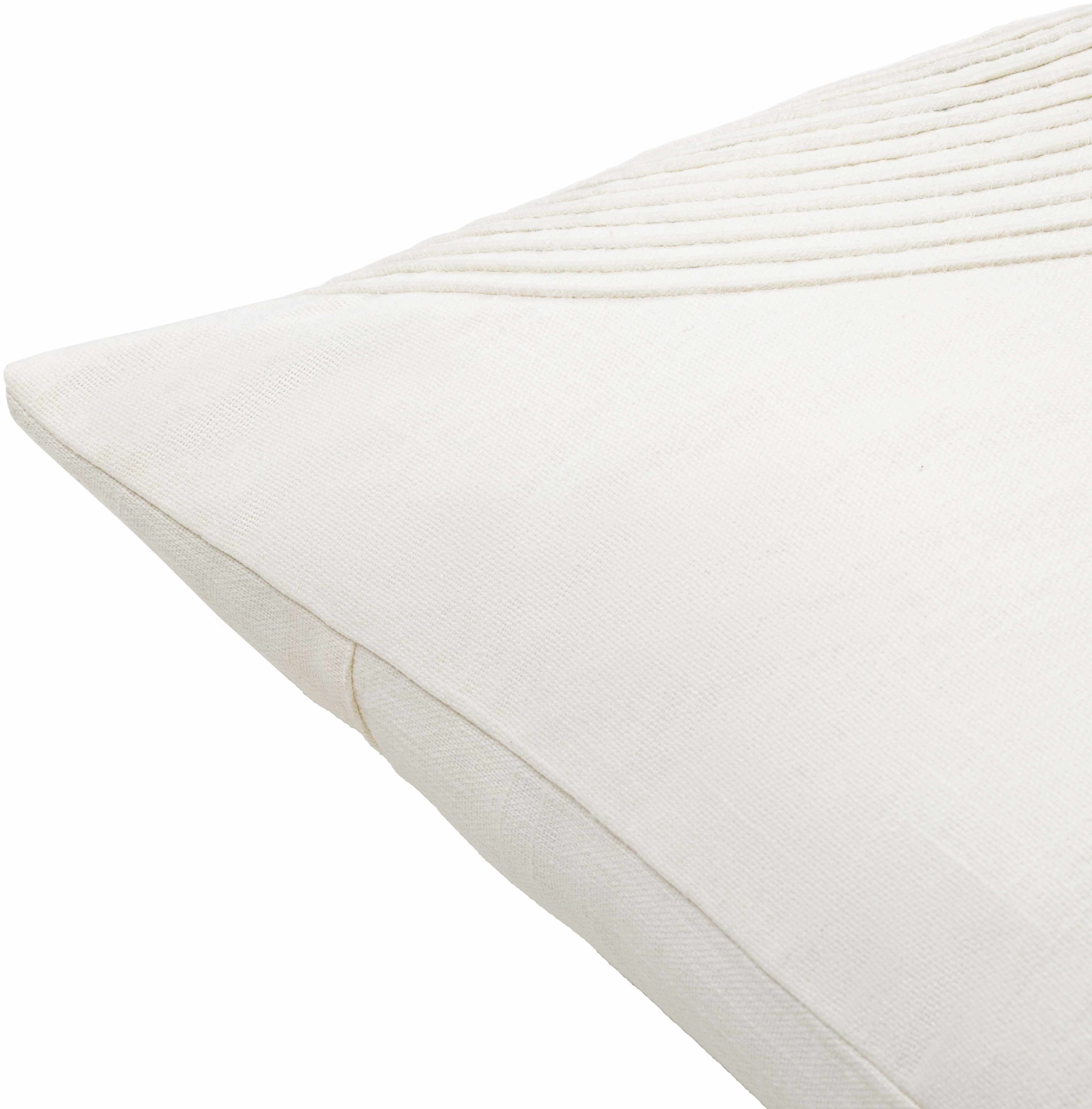 Close-up of a white mattress pad on a white background