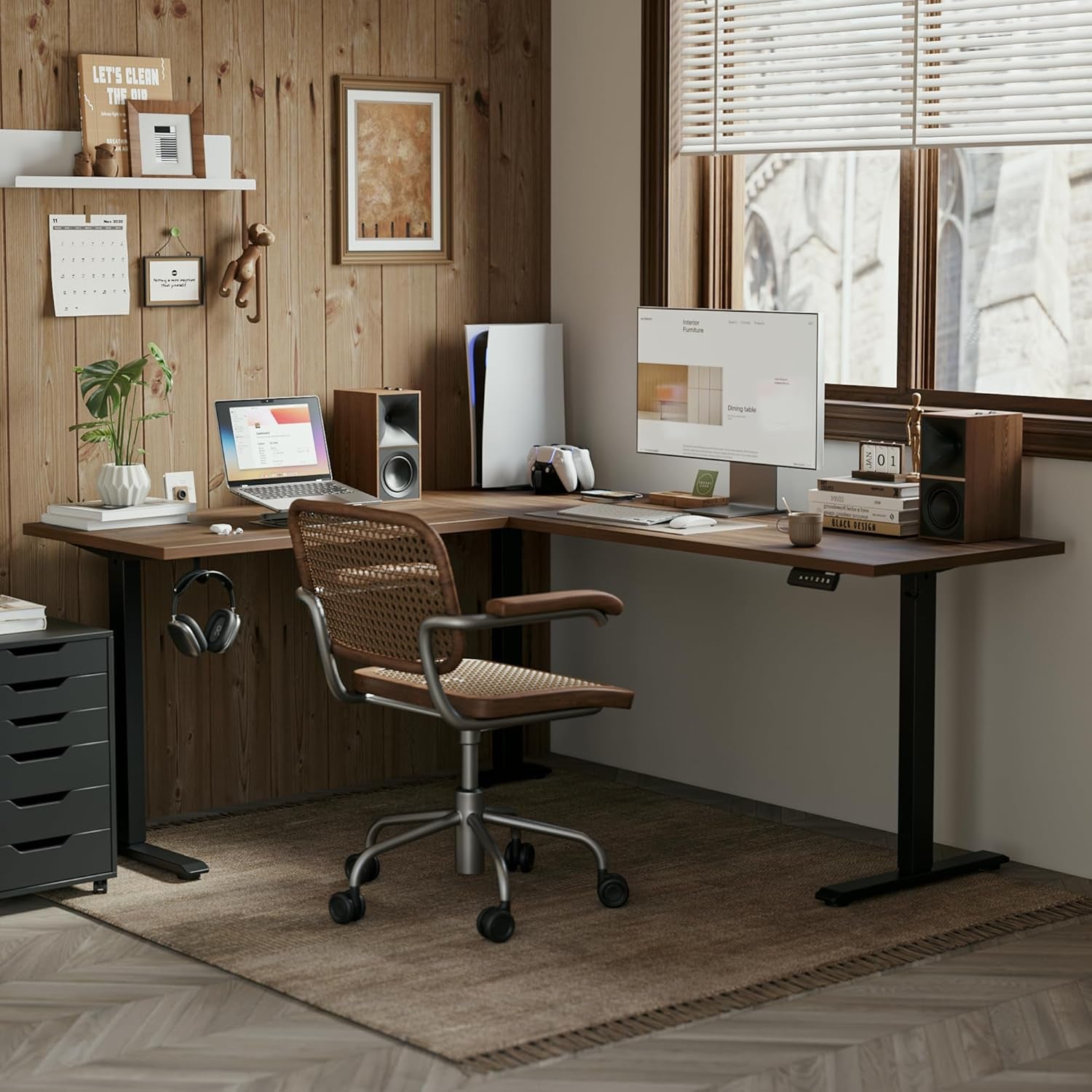 Home office with a wooden desk, chair, and computer setup.