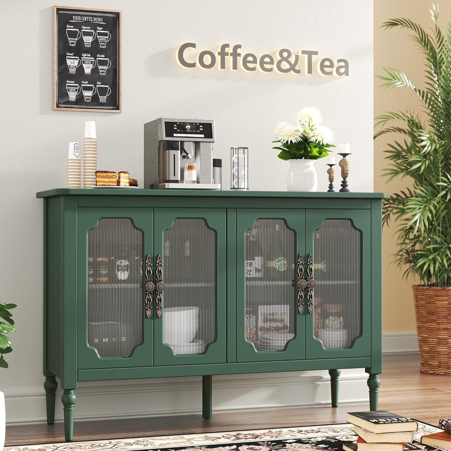 Green sideboard with coffee and tea items in a home setting