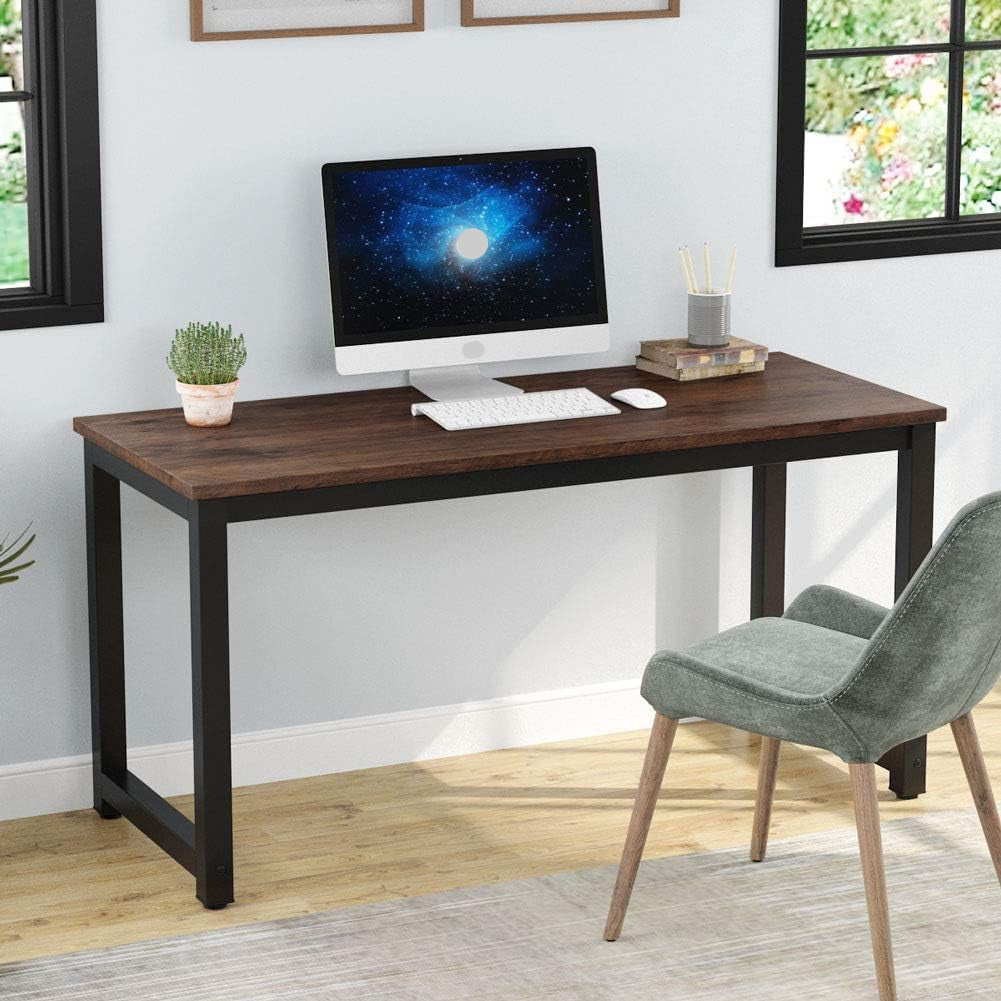 Wooden desk with computer setup in a home office setting