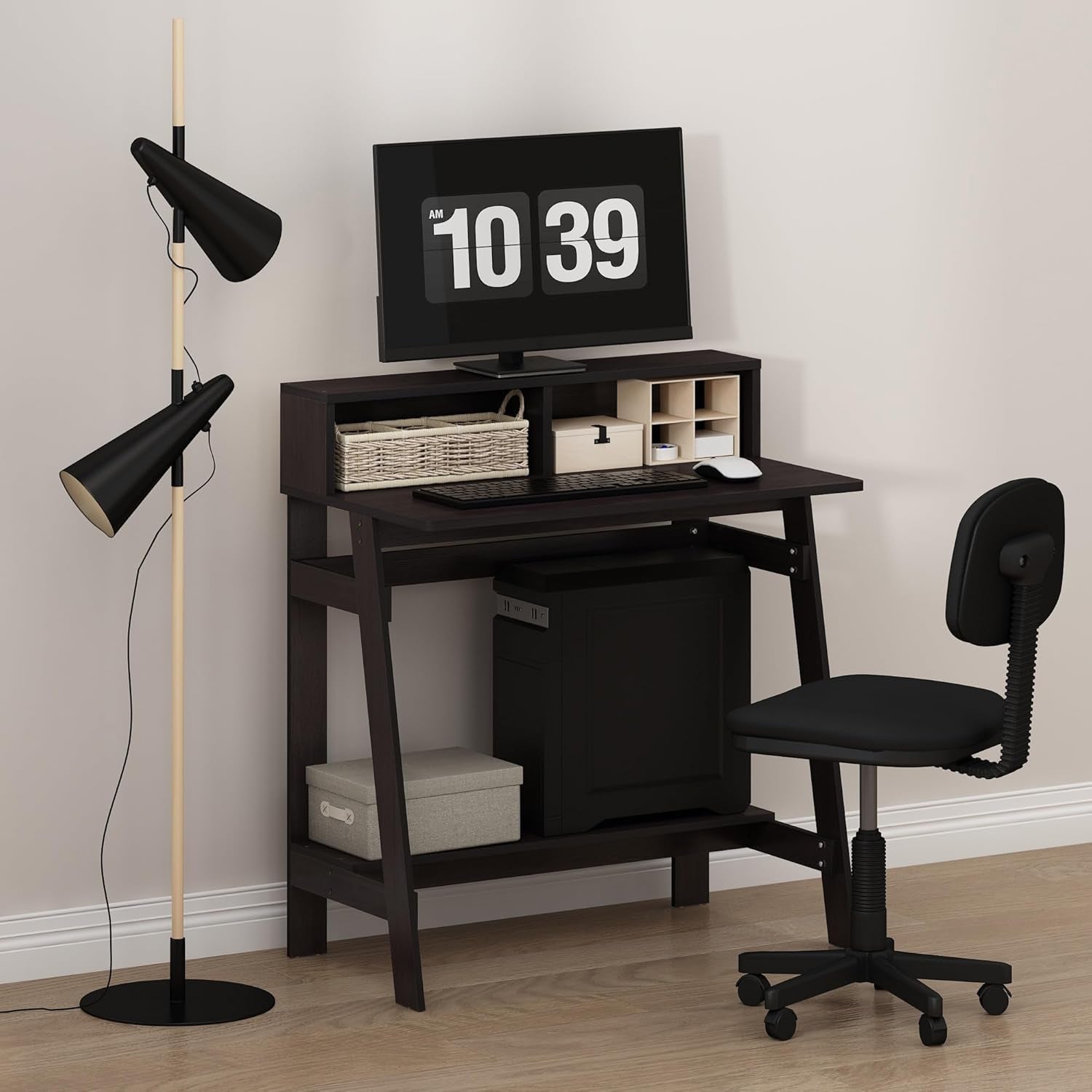 Modern home office setup with a desk, chair, and floor lamp.