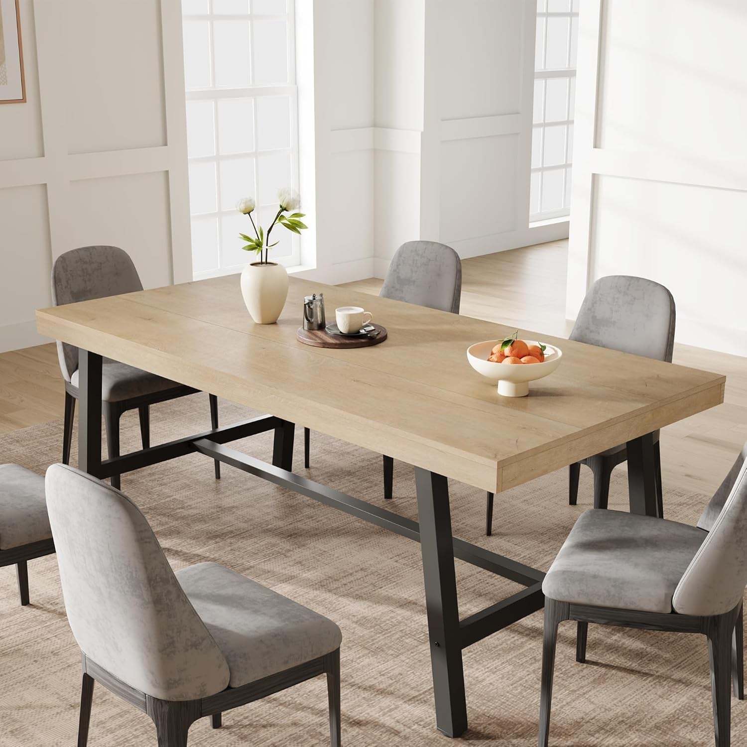Dining table set with chairs in a bright room